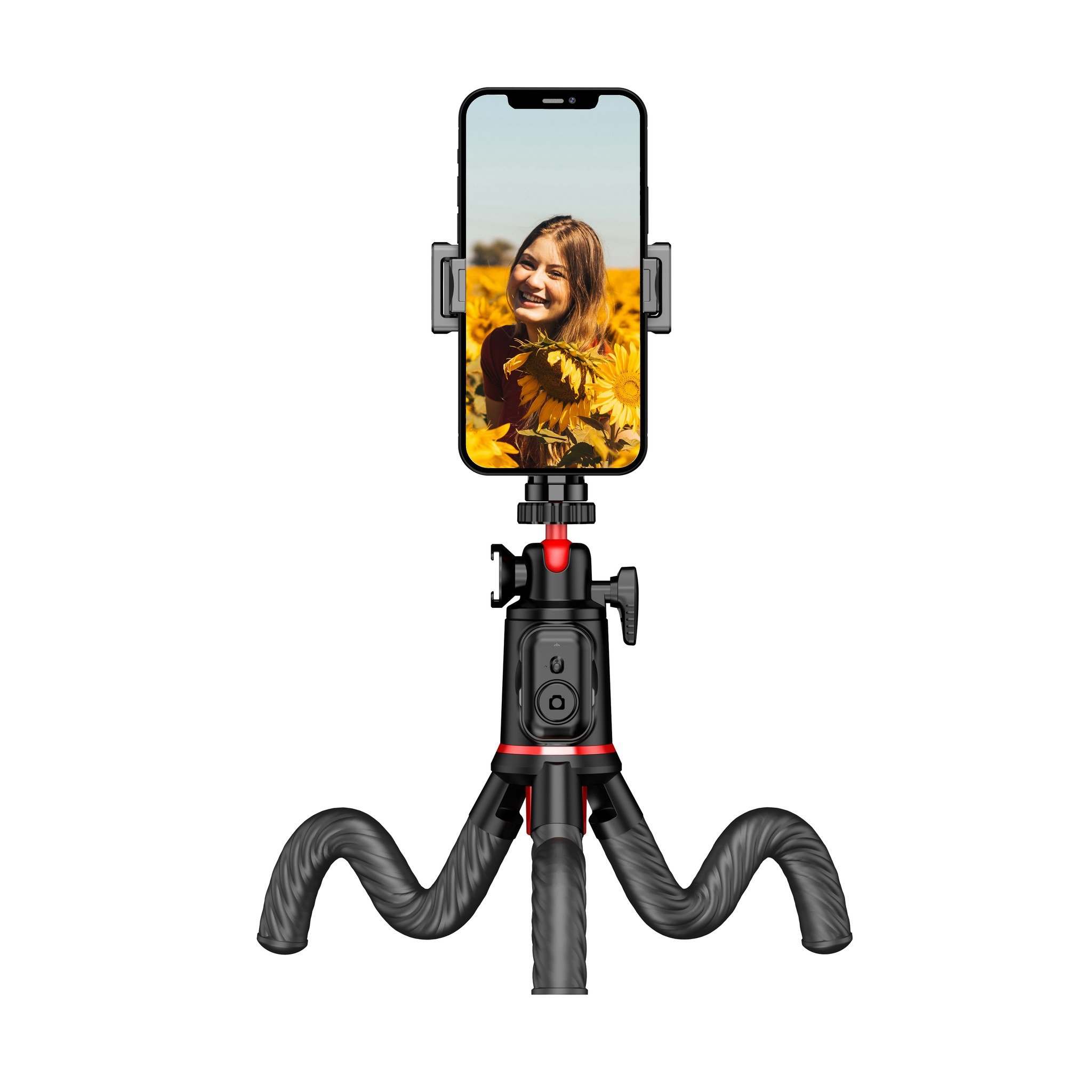 Un smartphone noir sur un trépied flexible affiche la photo d'une femme souriante dans un champ de tournesols.