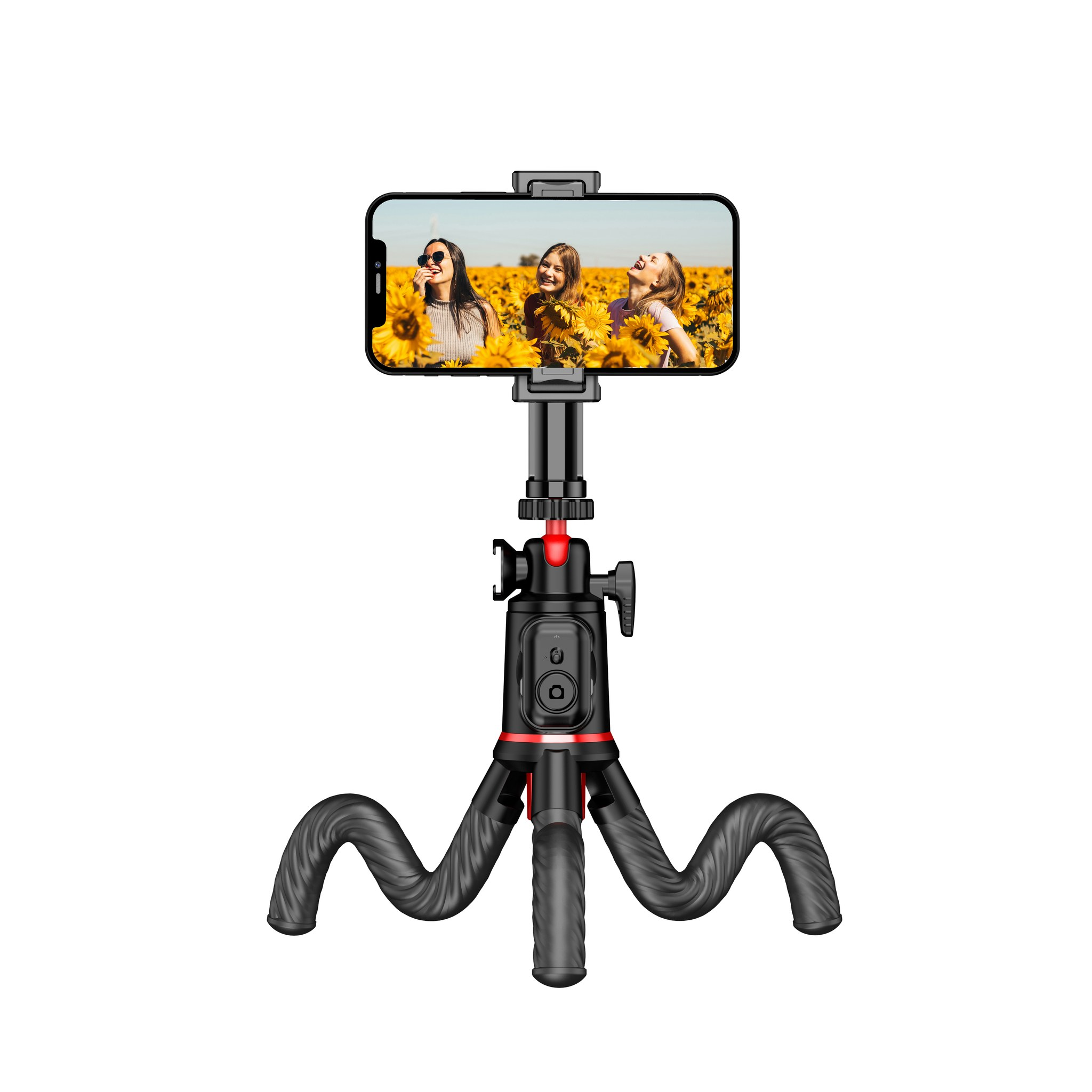 Un smartphone noir affichant une photo de trois femmes souriantes dans des tournesols, sur un trépied flexible.