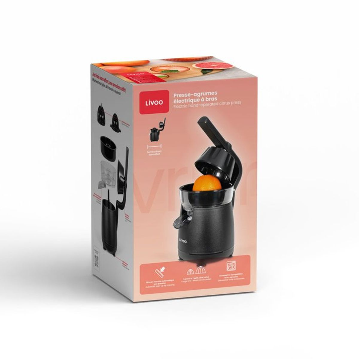 Scatola di uno spremiagrumes elettrico nero con un'arancia sul dispositivo.