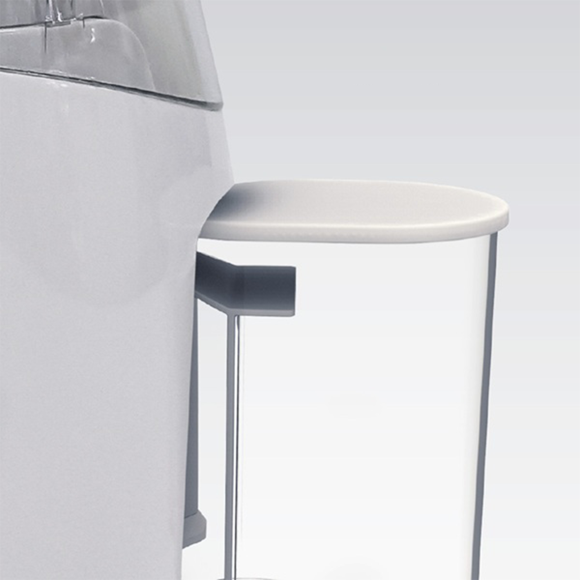 Un contenitore cilindrico bianco con bordo bianco è montato sul lato di un grande elettrodomestico bianco.