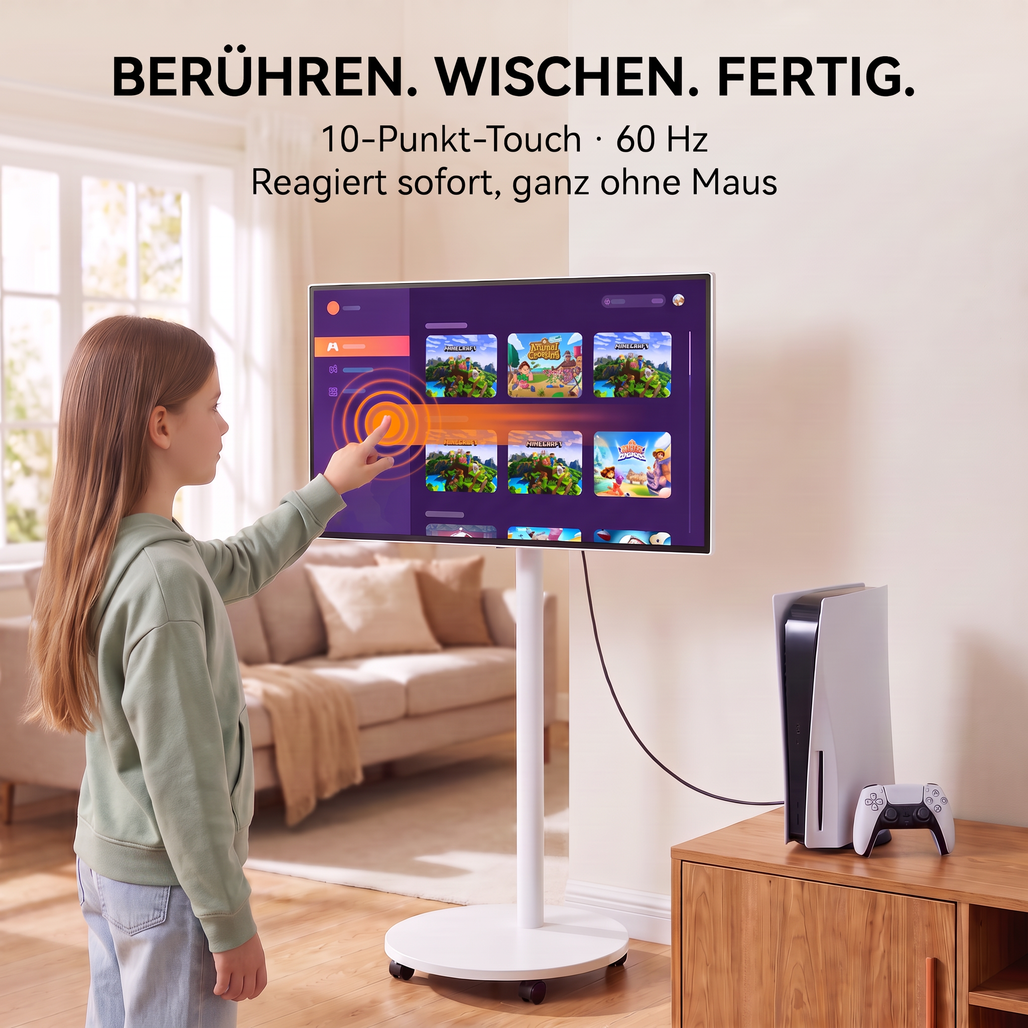 Ein Mädchen berührt den Bildschirm eines rollbaren Touch-Monitors in einem Wohnzimmer neben einer Spielkonsole.