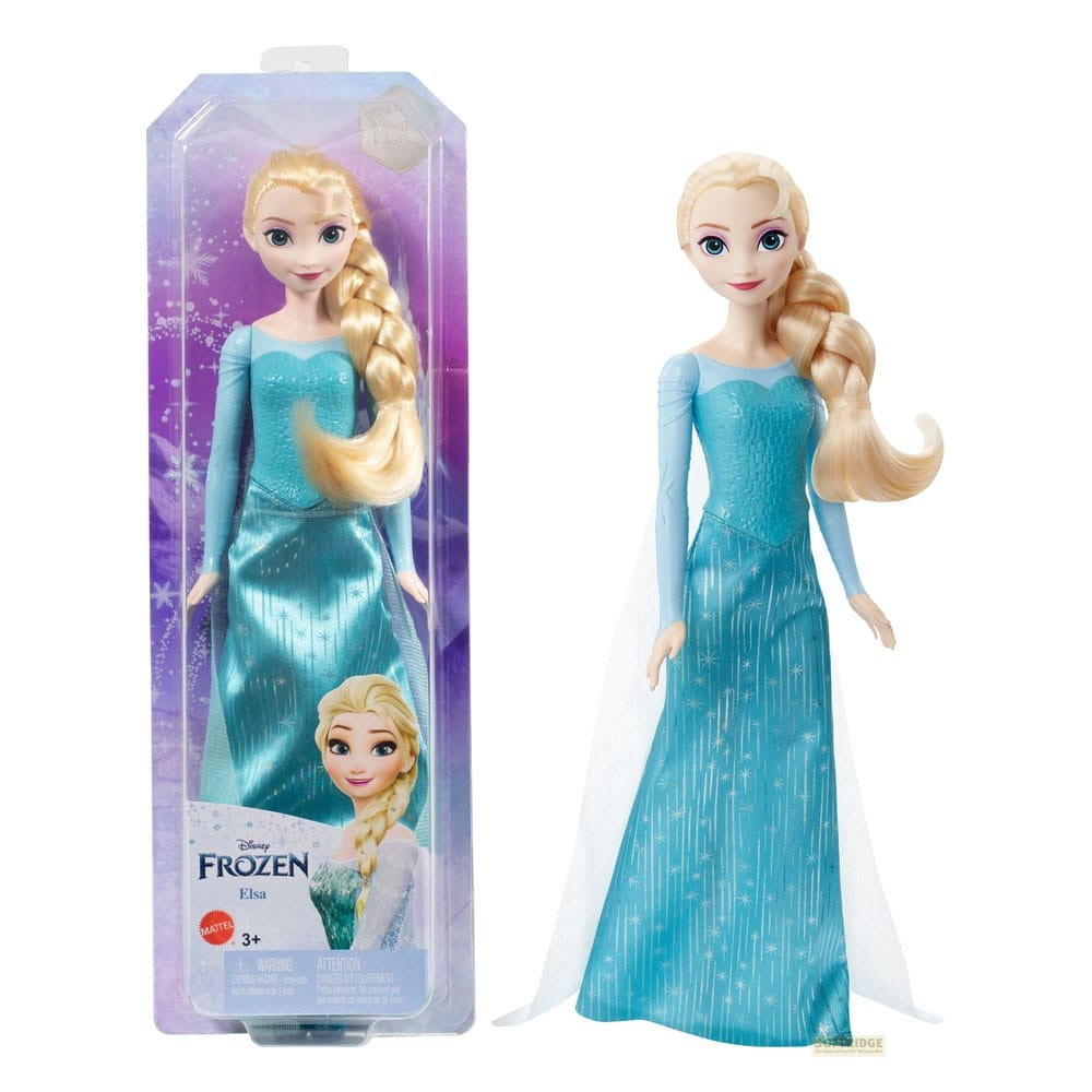 Une poupée Elsa de La Reine des Neiges en robe bleue à côté de son emballage.