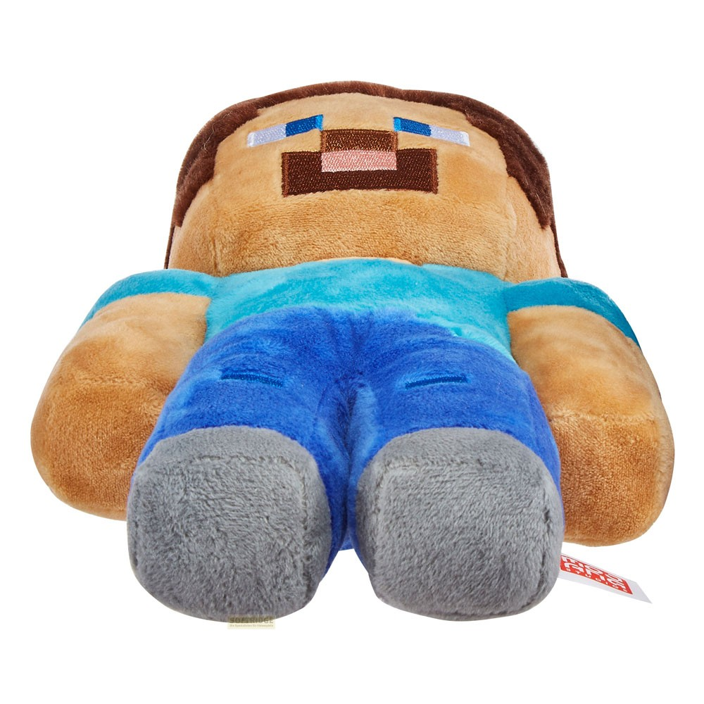 Peluche Minecraft Steve avec une chemise bleue et des chaussures grises sur fond blanc.