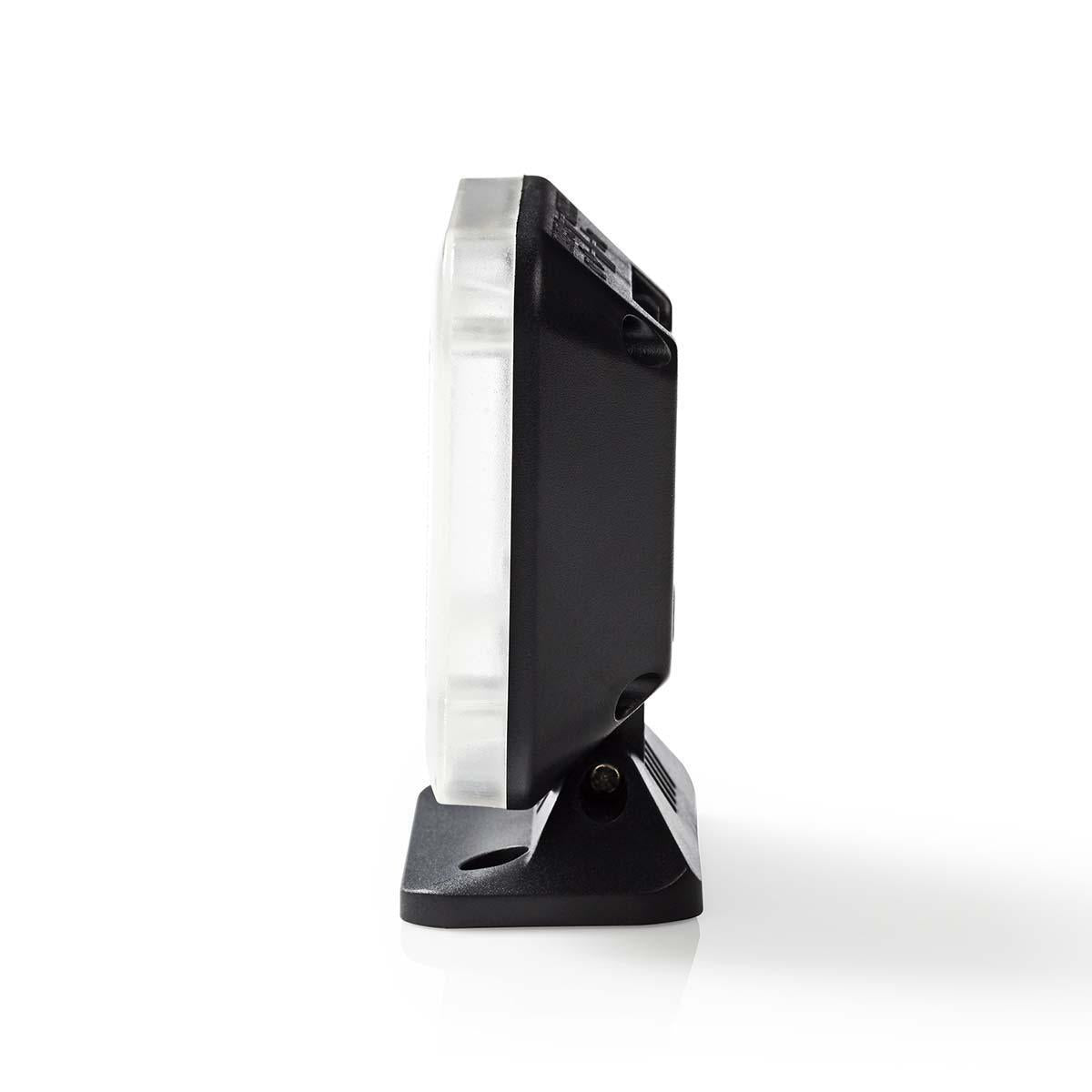 Un dispositivo elettronico in bianco e nero con supporto visto di lato su sfondo bianco.