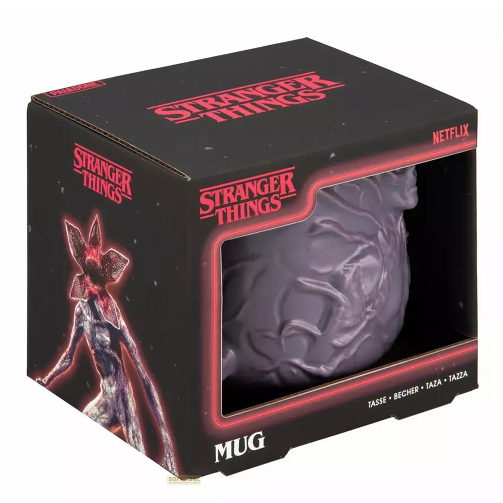 Una caja de taza negra de Stranger Things Demogorgon con logotipo rojo e imagen de la criatura.