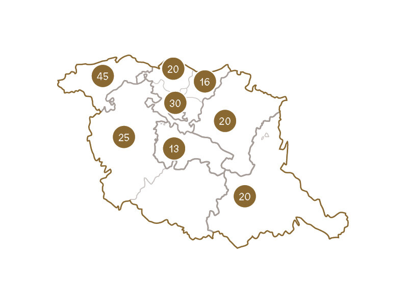 Un mapa blanco con contornos marrones y marcadores circulares con números.