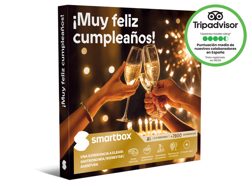 Caja de regalo Smartbox con una pareja celebrando brindando con copas de champán ante luces brillantes.