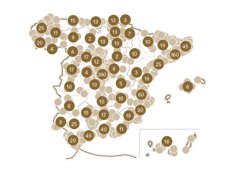 Mapa de España con círculos marrones y marrón claro con números que indican datos en varias regiones.