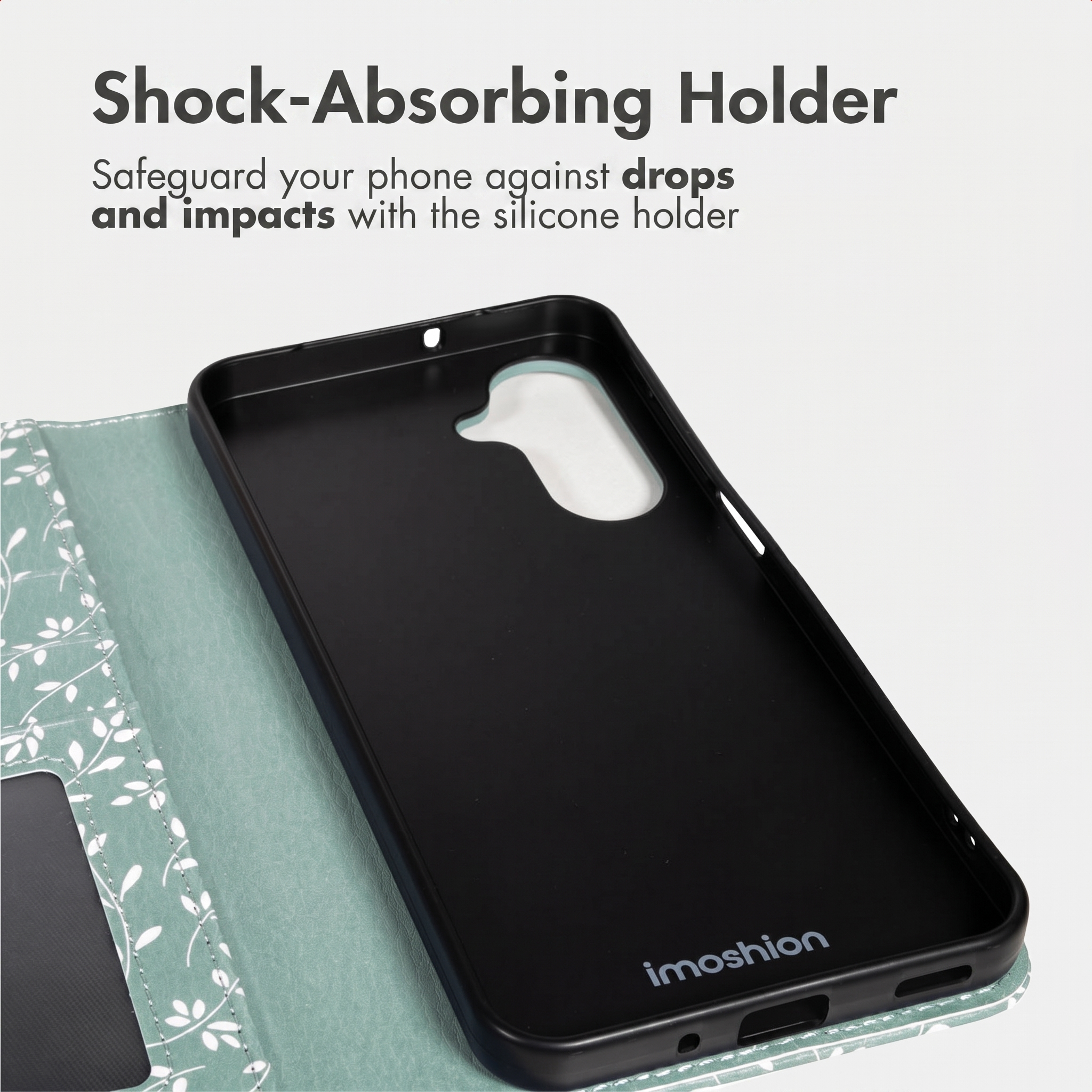 Mintgroene telefoonhoes met patroon, schokabsorberende zwarte houder en tekst.
