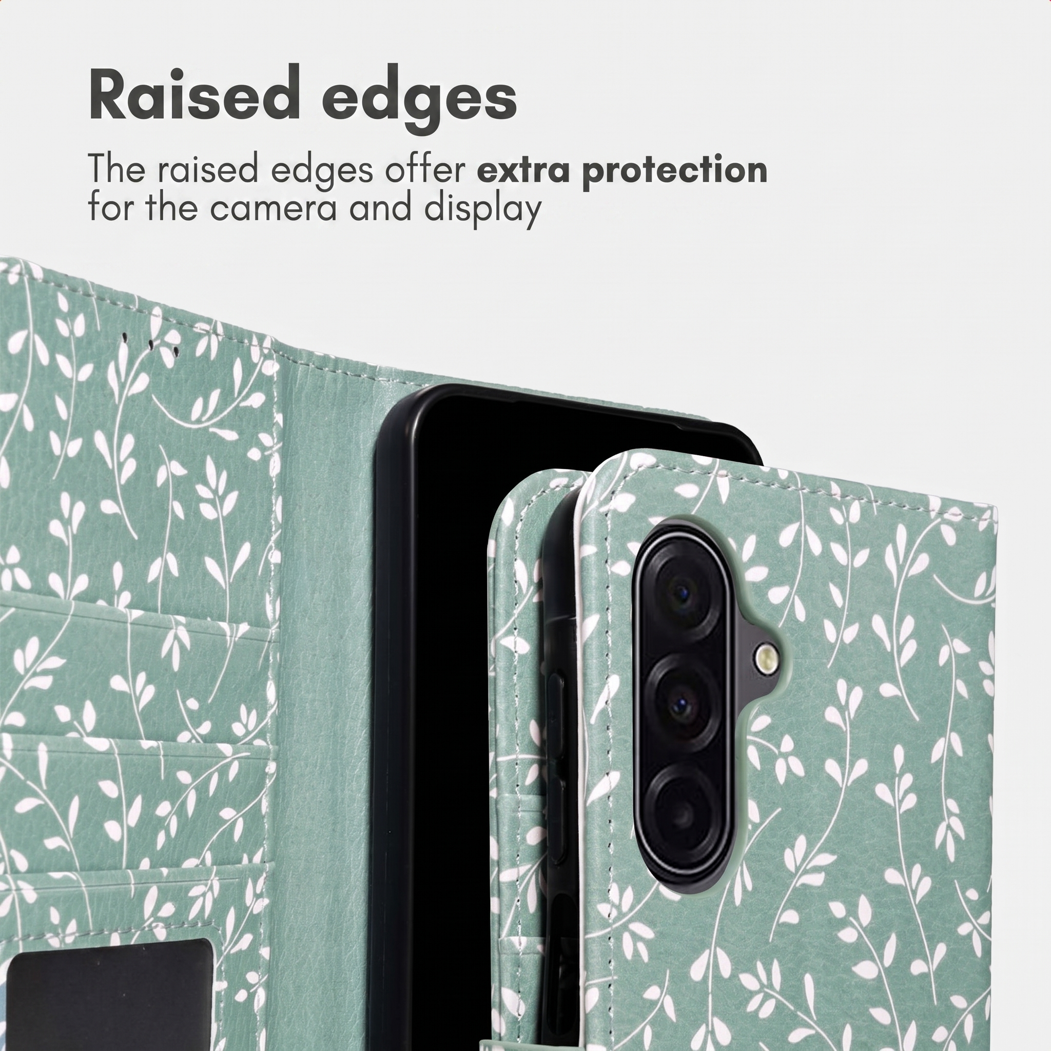 Groene telefoonhoes met wit bladmotief en opstaande randen ter bescherming van de camera.