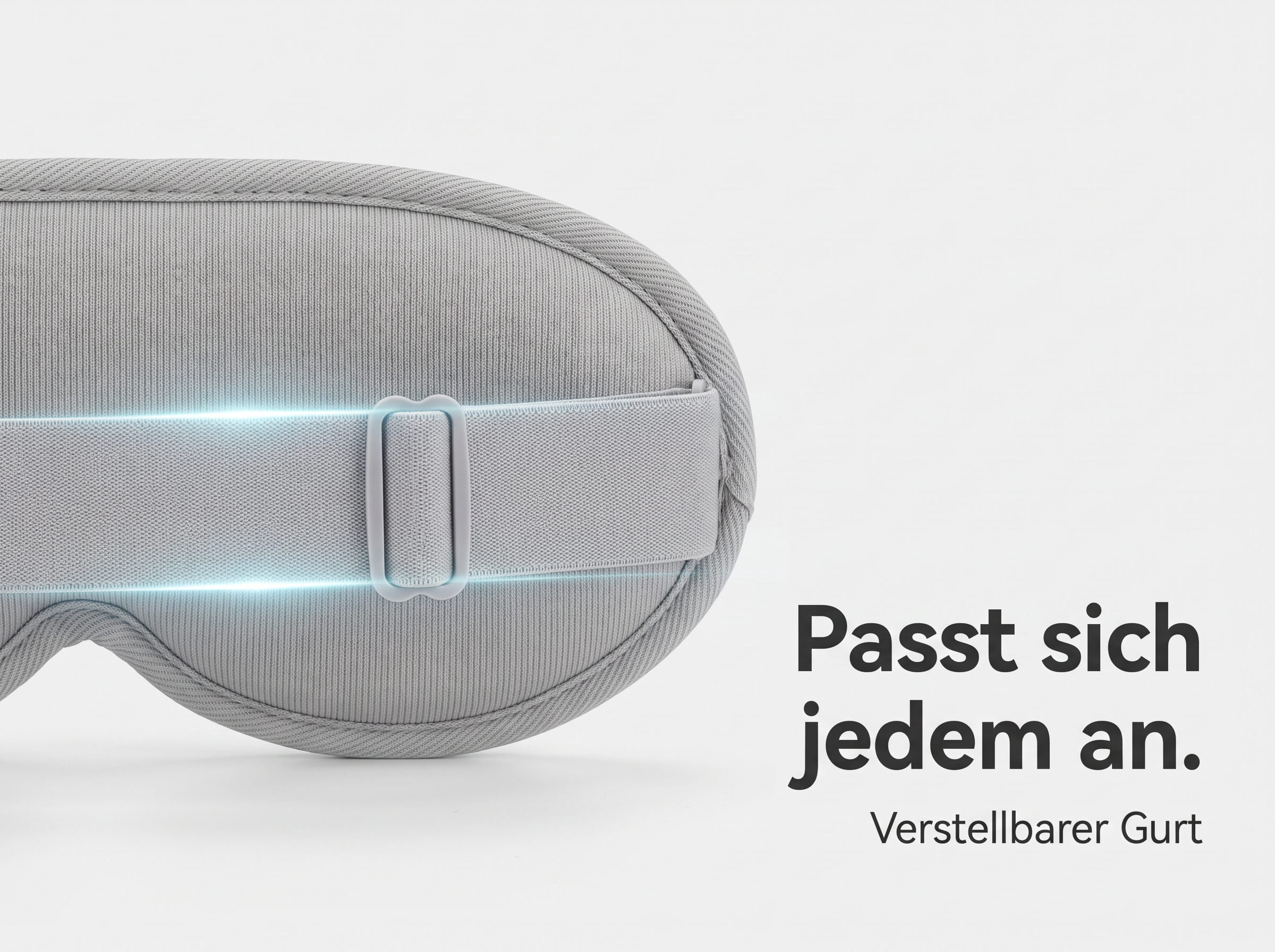Graue Schlafmaske mit verstellbarem Gurt auf hellem Hintergrund.