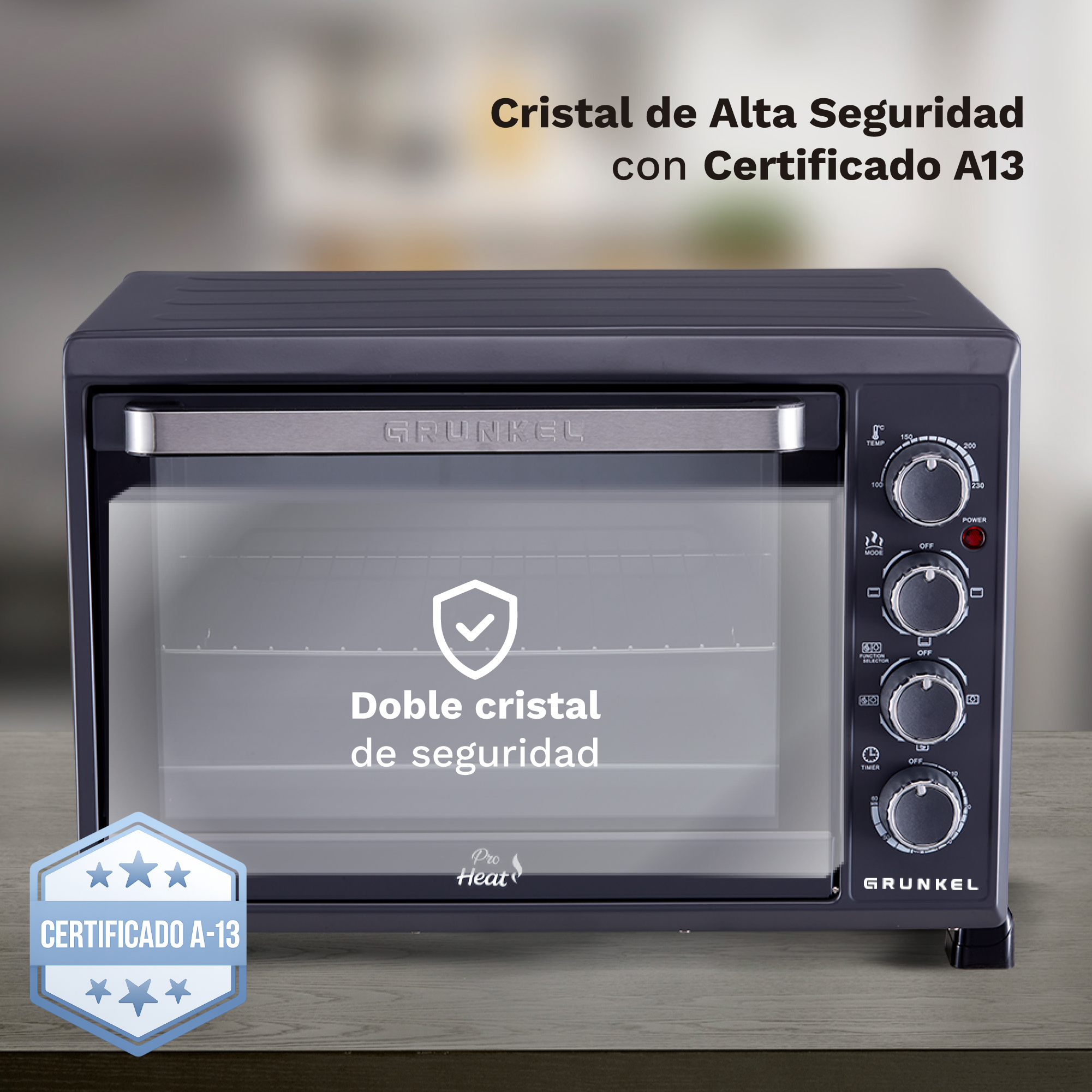 Un mini horno negro sobre una superficie de madera con perillas y texto.