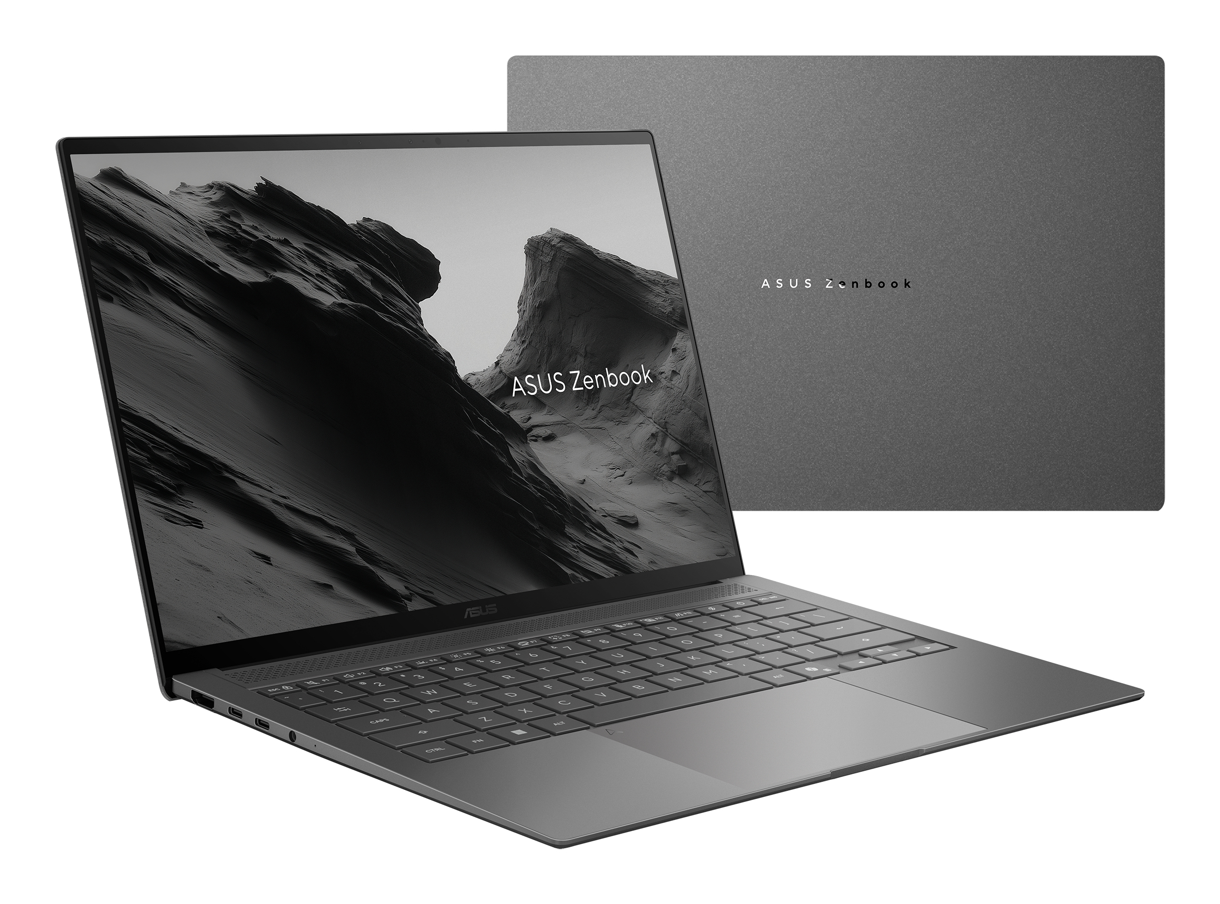 Ein geöffneter grauer Asus Zenbook Laptop mit Berg-Hintergrundbild, oben rechts mit geschlossenem Deckel.