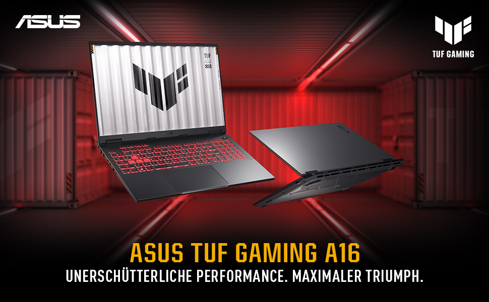 Ein ASUS TUF Gaming A16 Laptop vor einem roten Schiffscontainer-Hintergrund mit roter Beleuchtung.