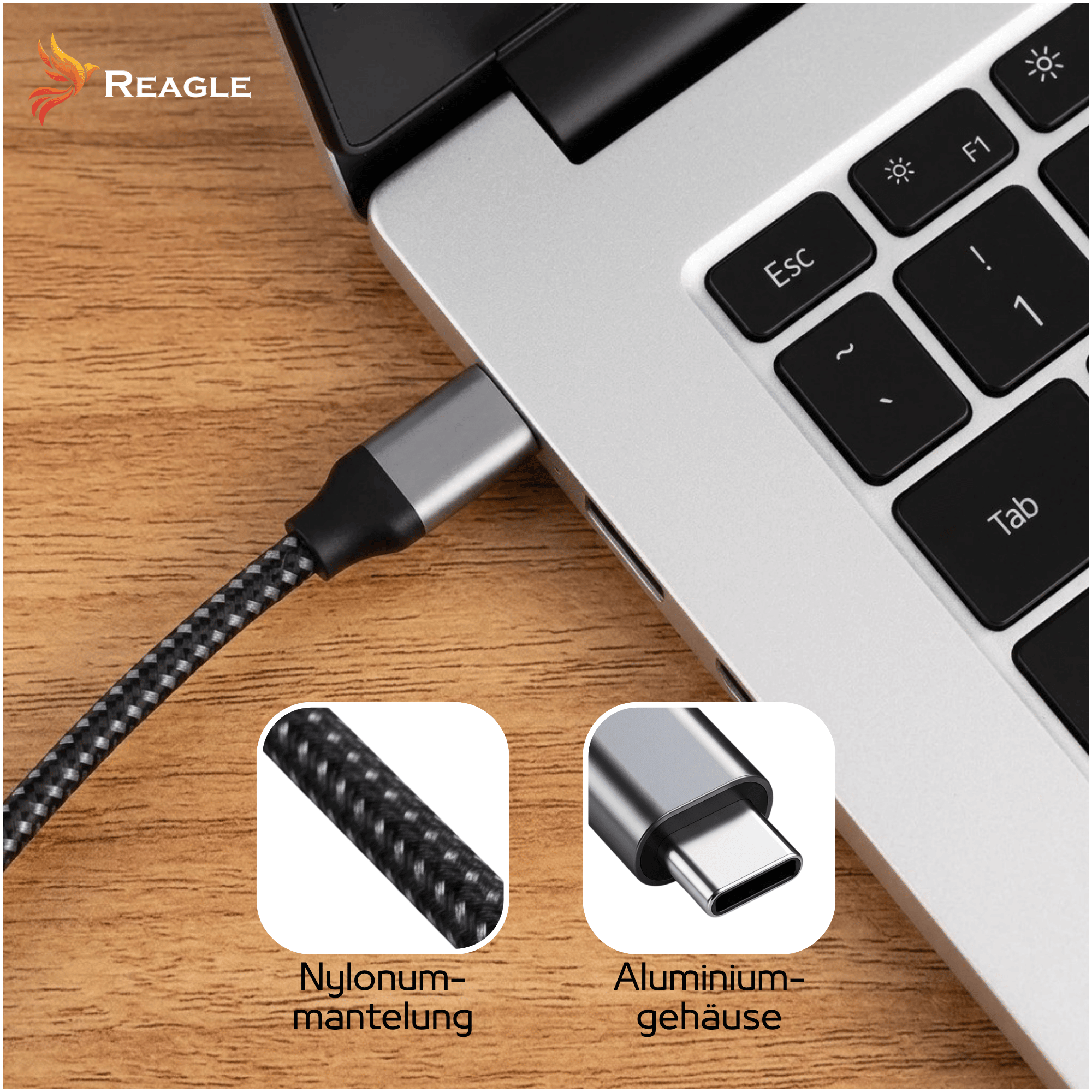 Oplątany kabel USB-C podłączony do srebrnego laptopa na drewnie, pokazujący nylon i aluminium.