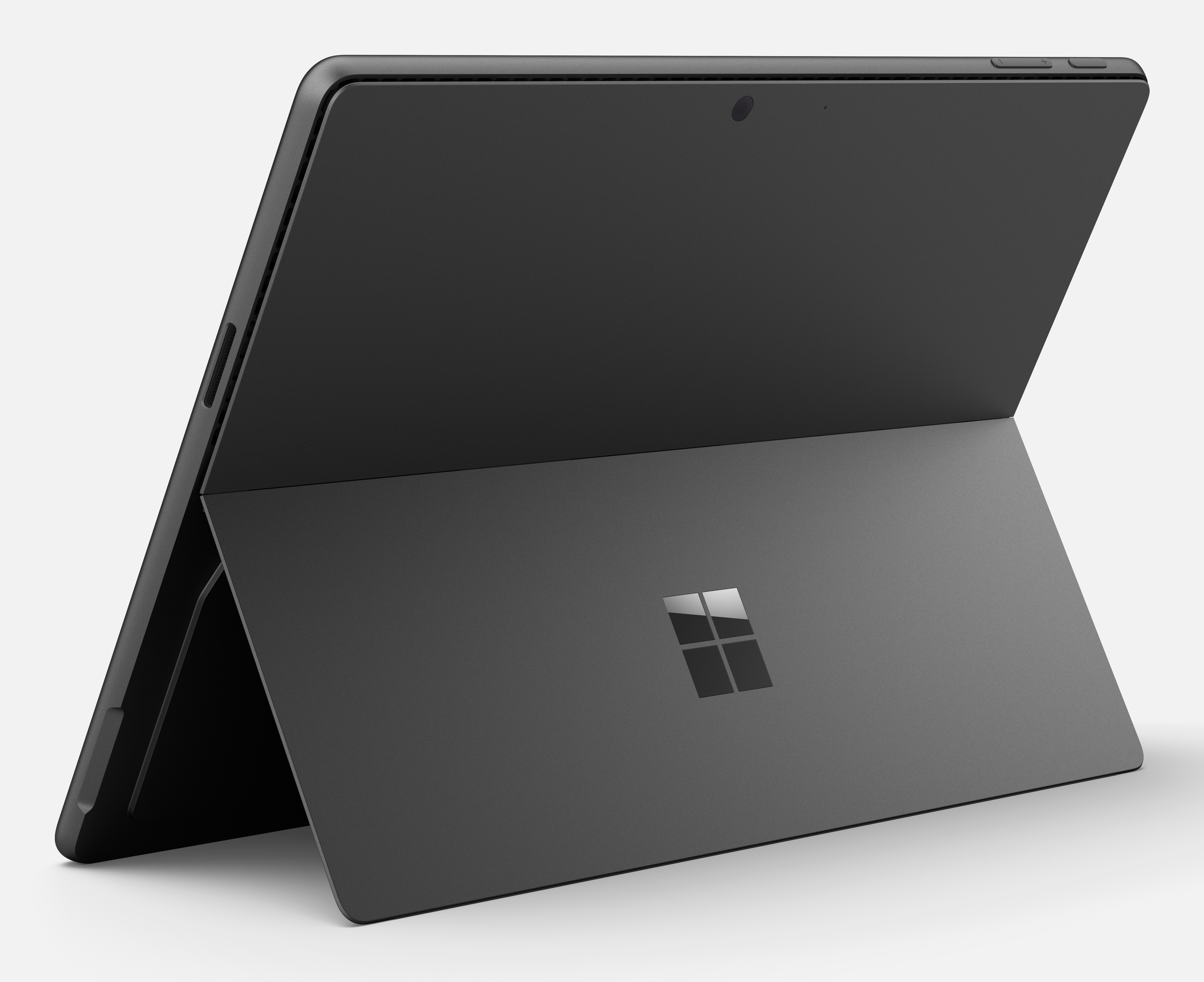 Szary tablet z podpórką i logo Microsoftu na białym tle.