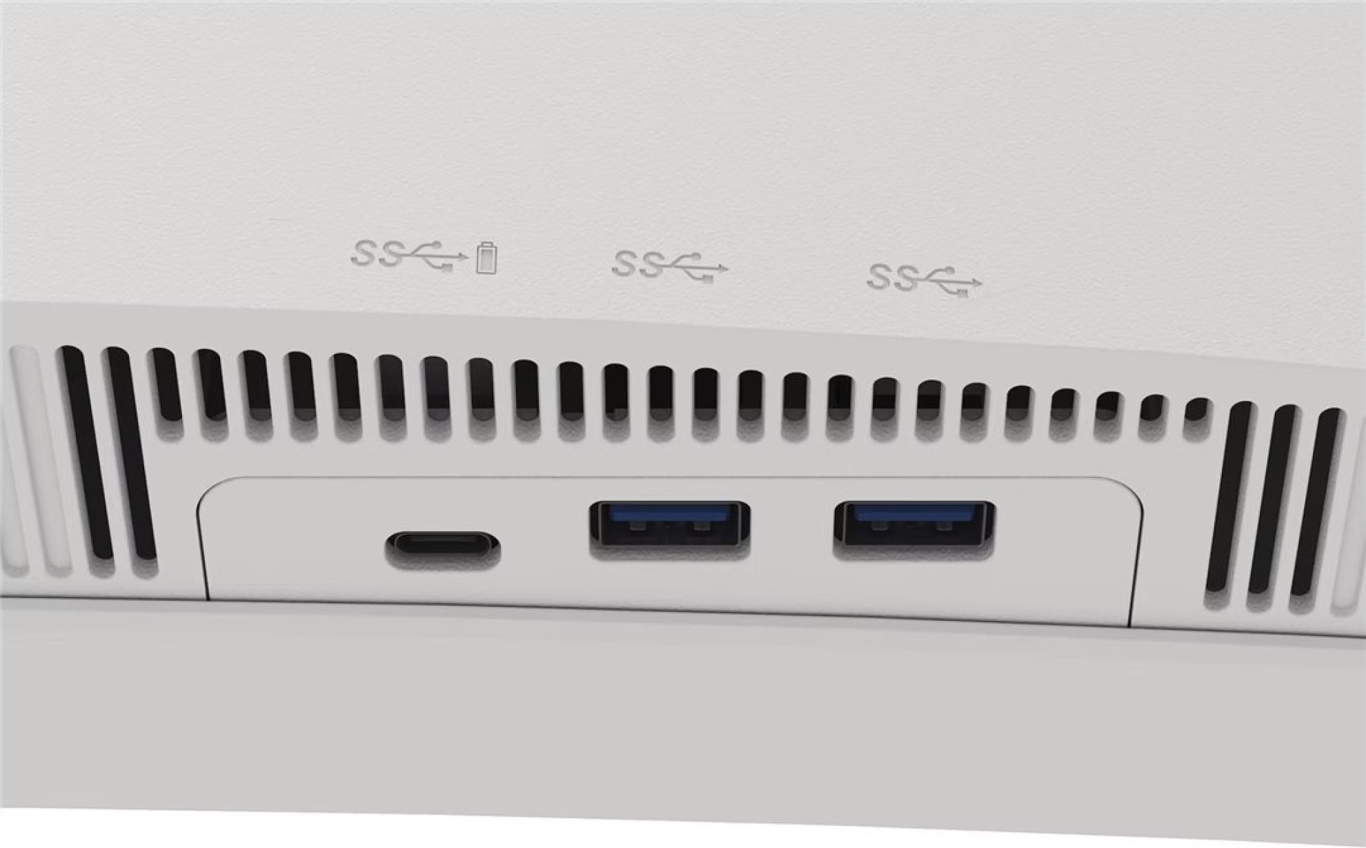 Pannello del dispositivo bianco con tre porte USB, tra cui una USB-C e due USB-A con icone stampate sopra.