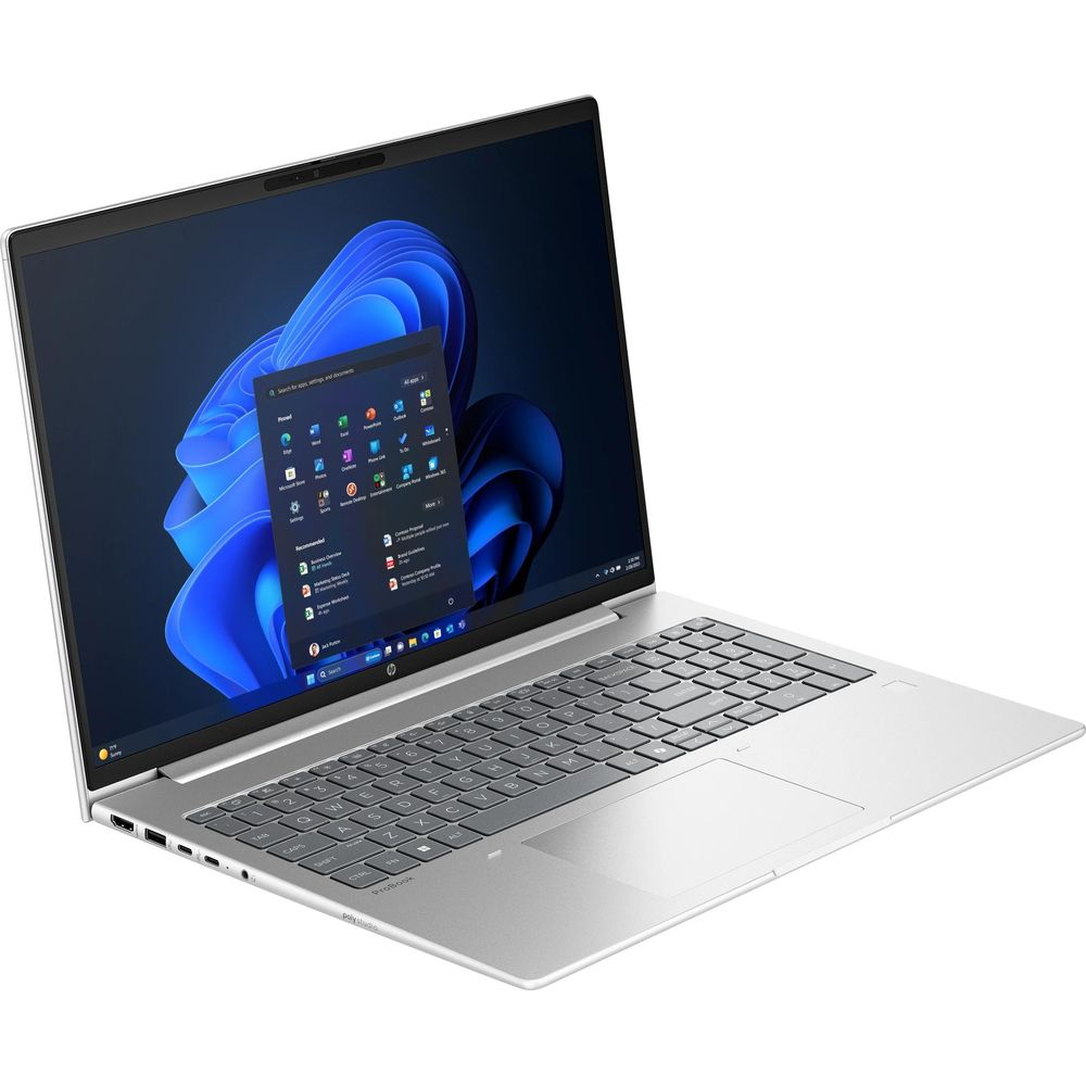 Ordinateur portable argenté avec écran bleu et menu démarrer ouvert sur fond blanc.