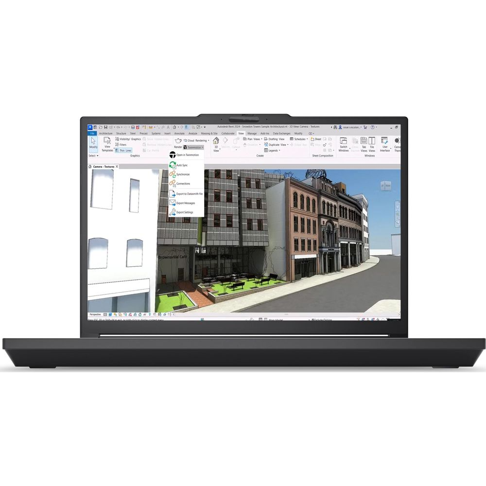 Un computer portatile mostra un software di architettura CAD con un modello di città 3D e un menu a tendina.