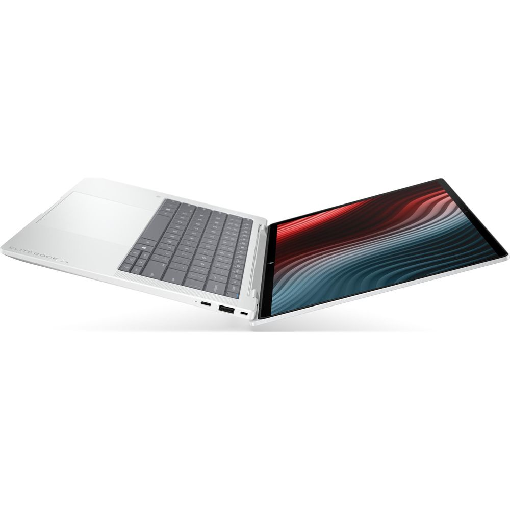 Un ordinateur portable argenté avec clavier gris et écran abstrait coloré sur fond blanc.