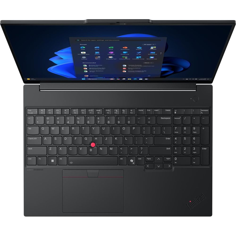 Vue de dessus d'un ordinateur portable noir avec écran actif et clavier avec un TrackPoint rouge.