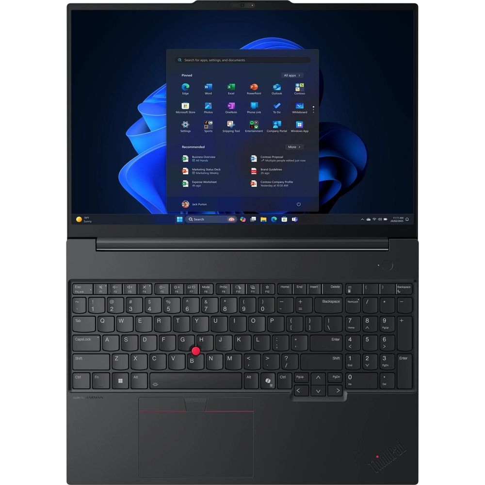 Un ordinateur portable noir avec le bureau Windows 11 affichant des icônes d'applications et un fond bleu, un clavier complet et un pavé tactile.