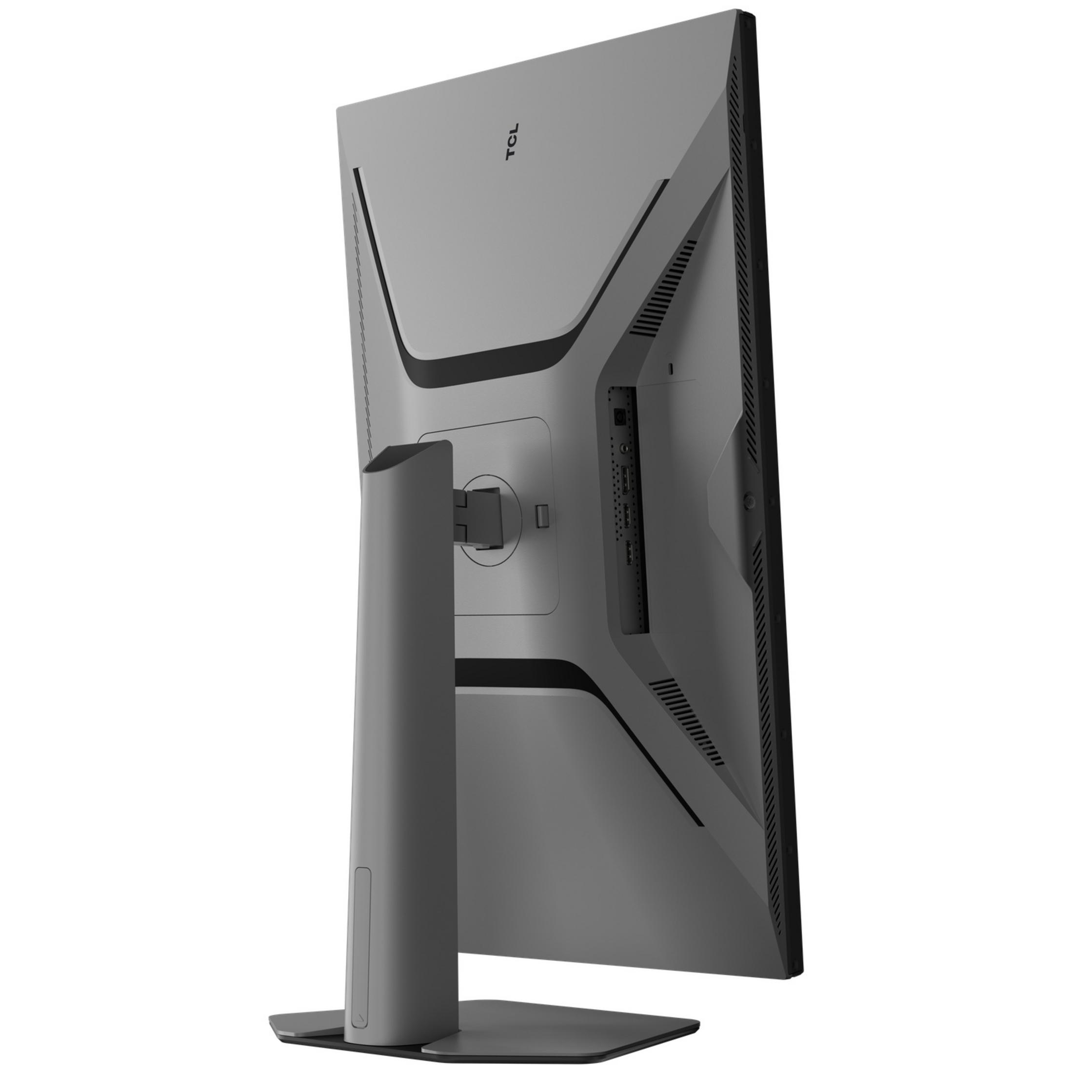 Vista posteriore di un monitor TCL grigio con supporto ergonomico e fessure di ventilazione su sfondo bianco.