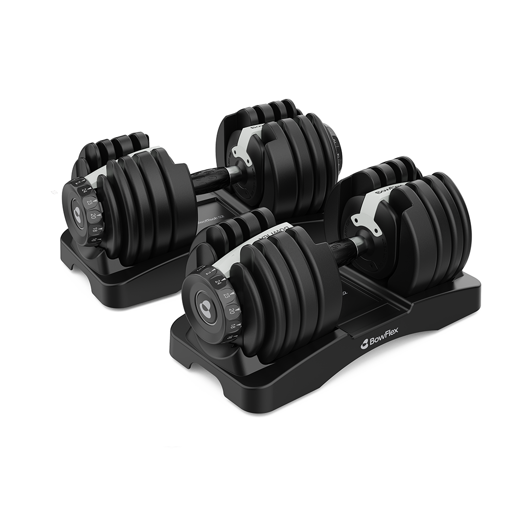 Dos mancuernas ajustables Bowflex negras en sus soportes sobre fondo blanco.