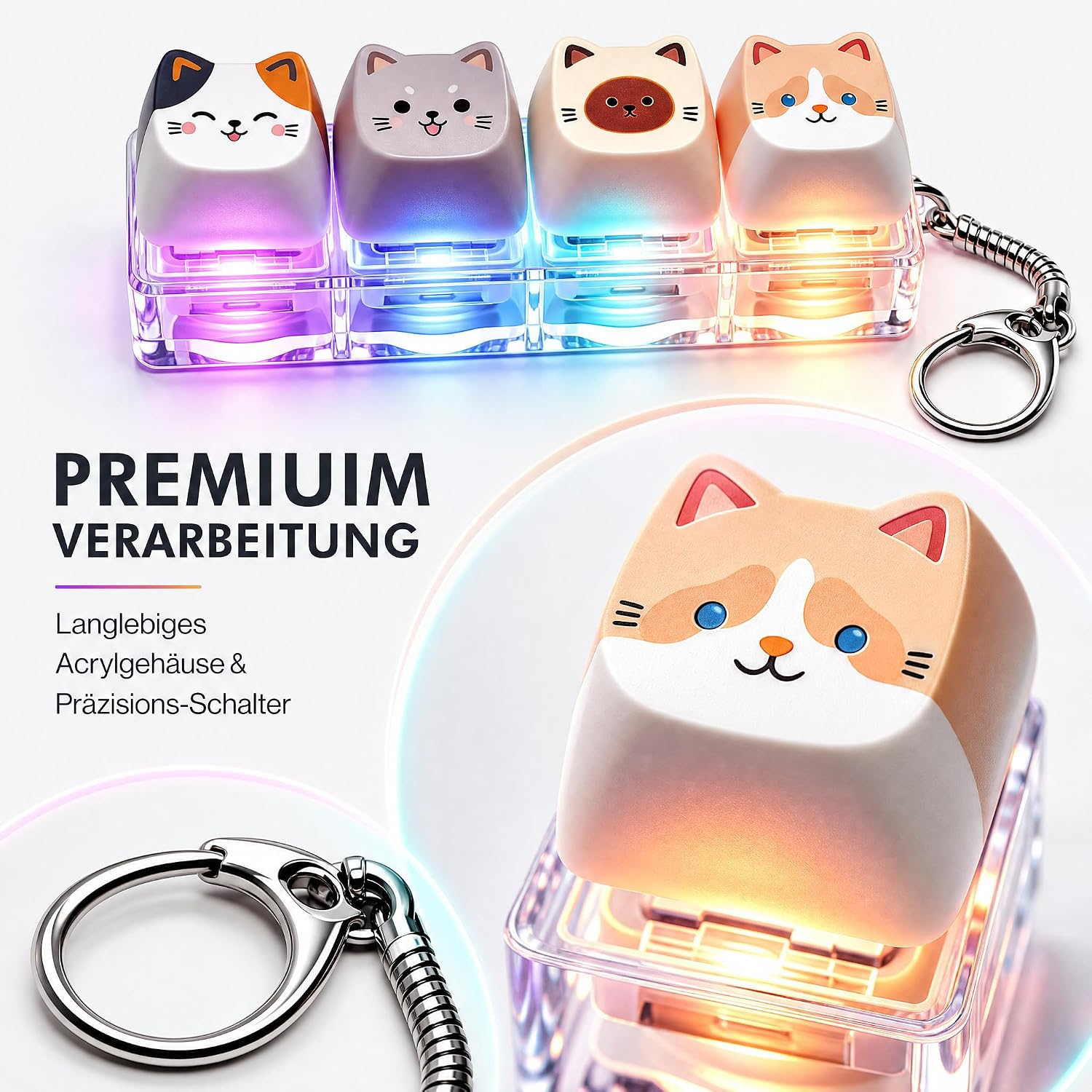 Vier leuchtende Katzen-Keycaps auf einem Acrylsockel als Schlüsselanhänger.