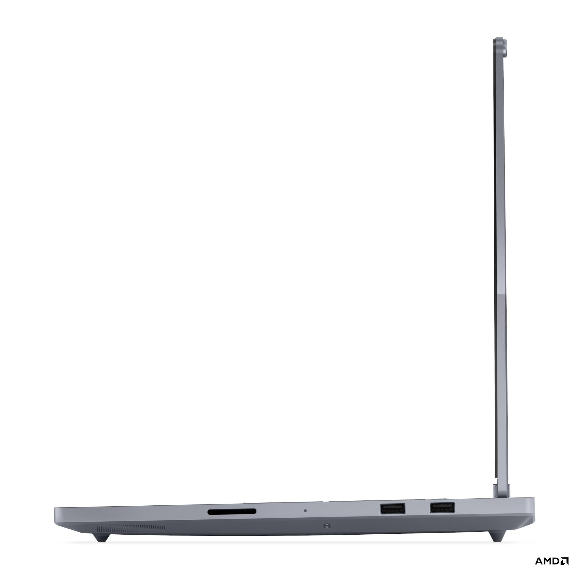 Vista laterale di un laptop grigio che mostra le porte e il logo AMD.