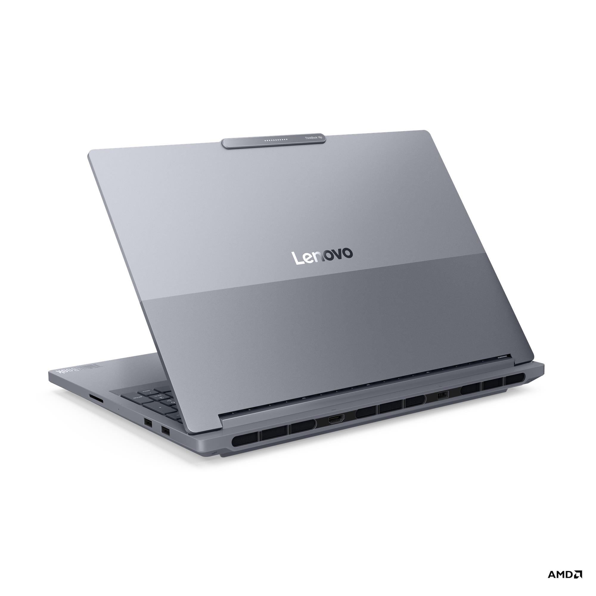 Laptop Lenovo grigio visto da dietro, con prese d'aria, porte e logo su sfondo bianco.