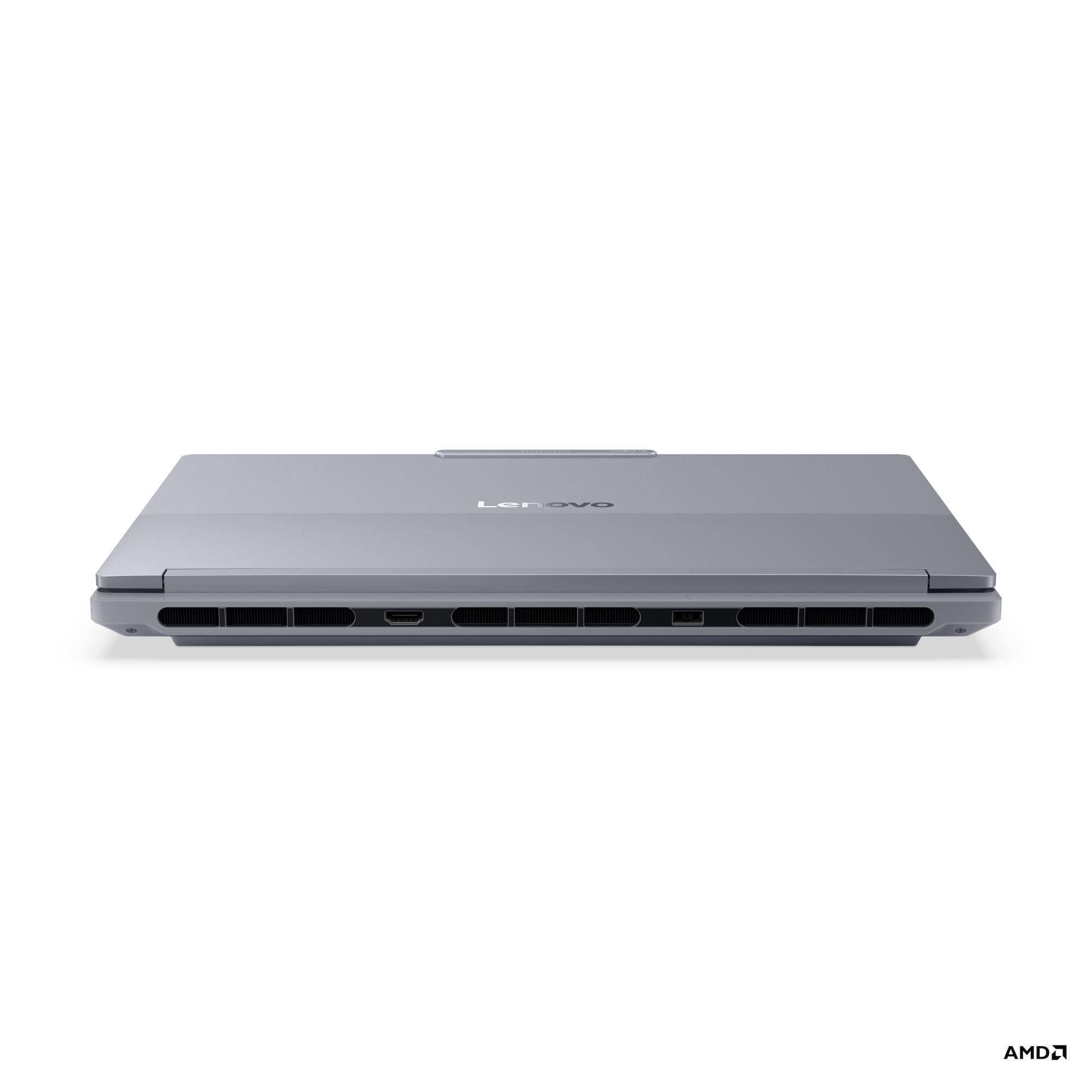 Il retro grigio di un laptop Lenovo chiuso con prese d'aria e porte su sfondo bianco.