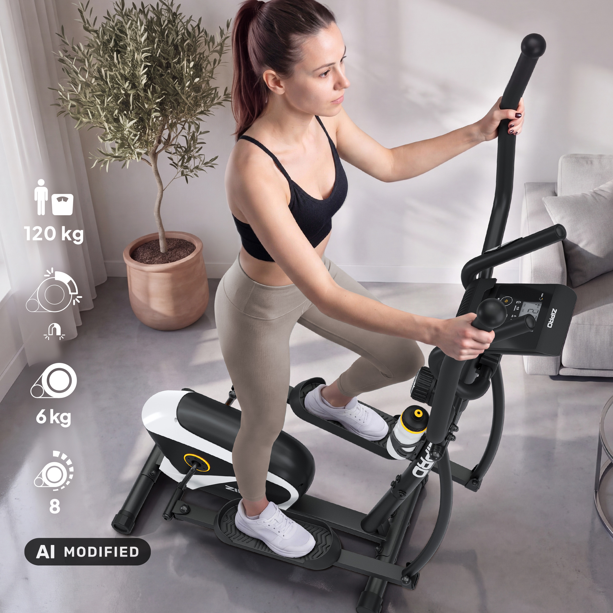 Una donna in abbigliamento sportivo si allena su un'ellittica in una stanza luminosa.