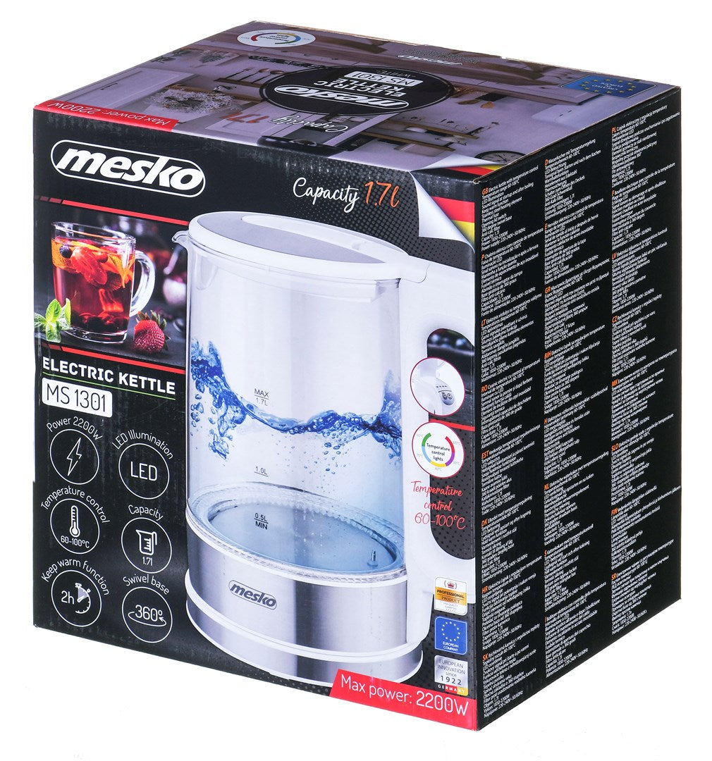 Opakowanie czajnika elektrycznego Mesko MS 1301 z cechami produktu i zdjęciami.