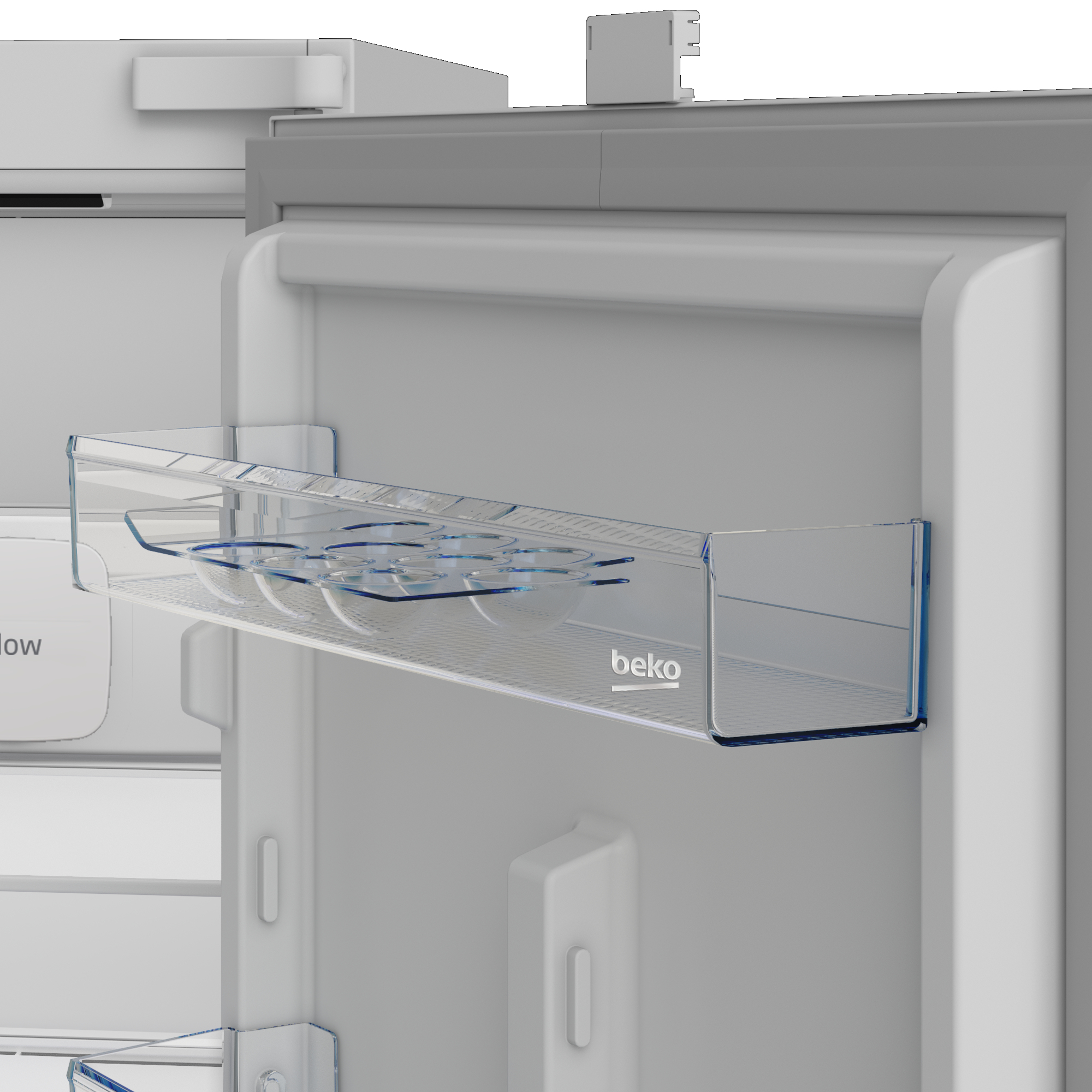 Primer plano del interior de una puerta de refrigerador Beko con estante de plástico y huevera.