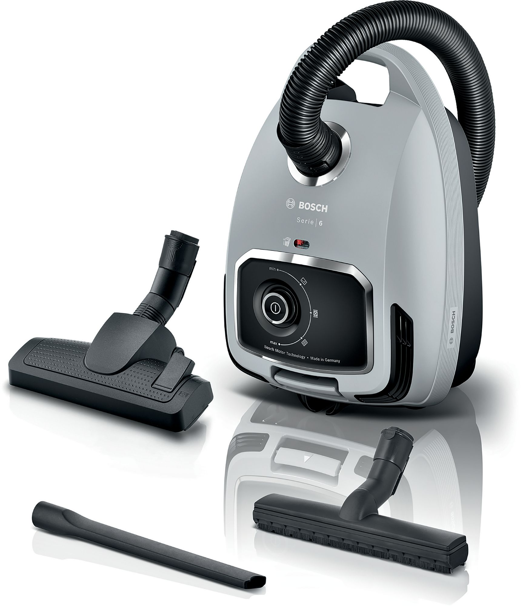 Aspirapolvere grigio Bosch Serie 6 con tubo, bocchetta per pavimenti e lancia su sfondo bianco.