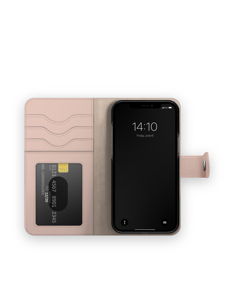 Offene rosa Leder-Handyhülle mit Kartenfächern und einer Kreditkarte, die ein Smartphone hält.