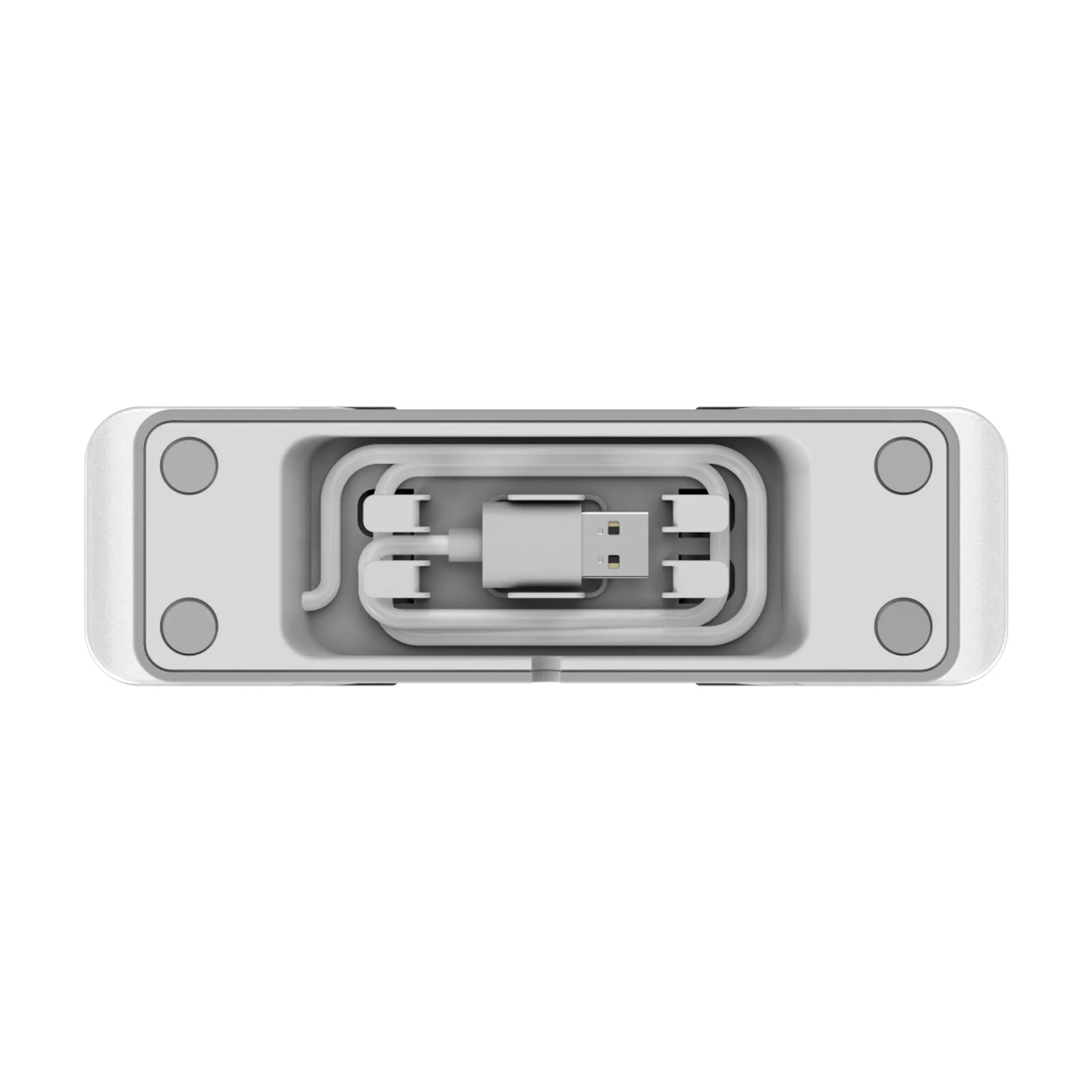 Ein weißes Ladegehäuse mit integriertem, ordentlich aufgewickeltem USB-Kabel im Mittelteil und Gummifüßen.