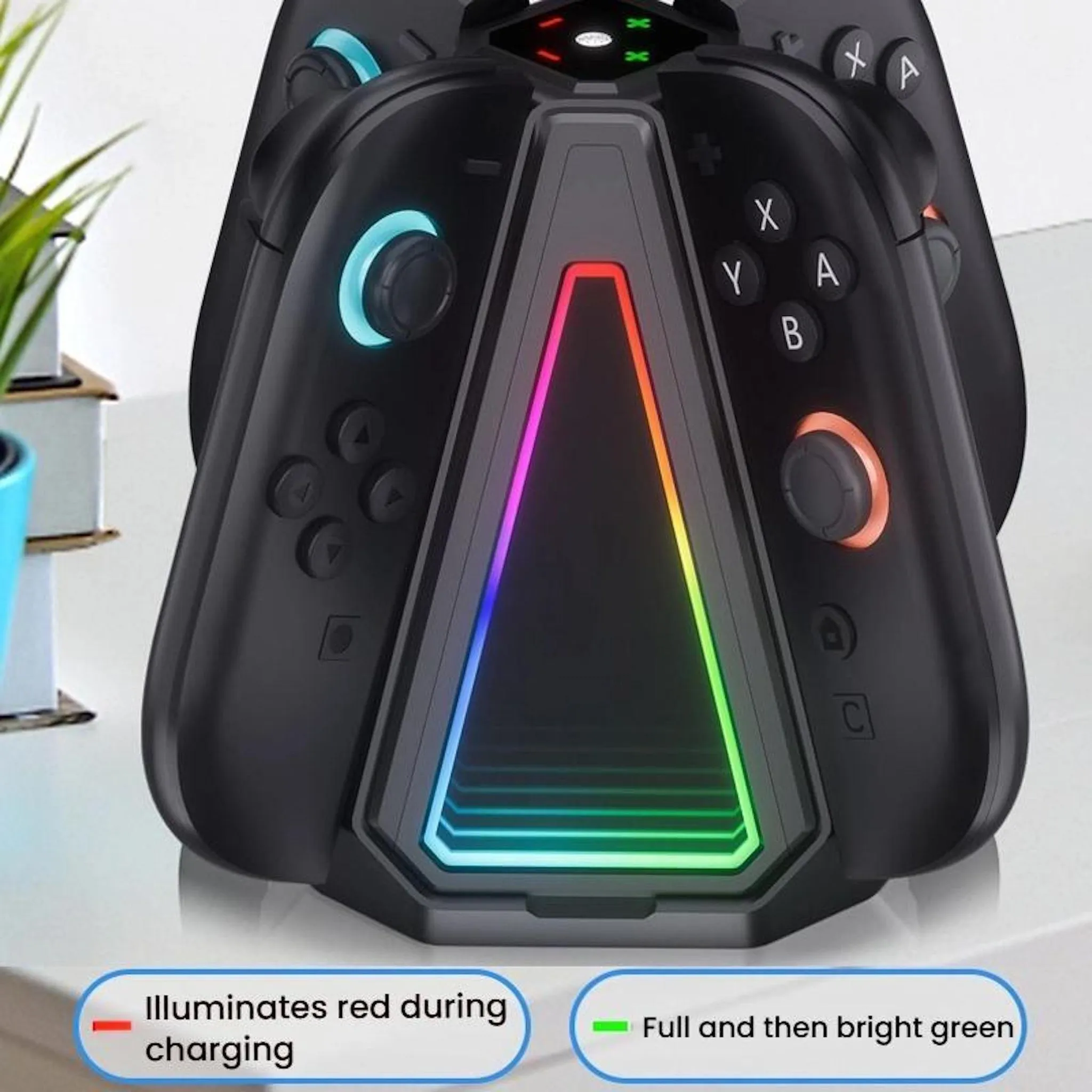 Eine schwarze Gaming-Controller-Ladestation mit RGB-Beleuchtung auf einem Tisch.