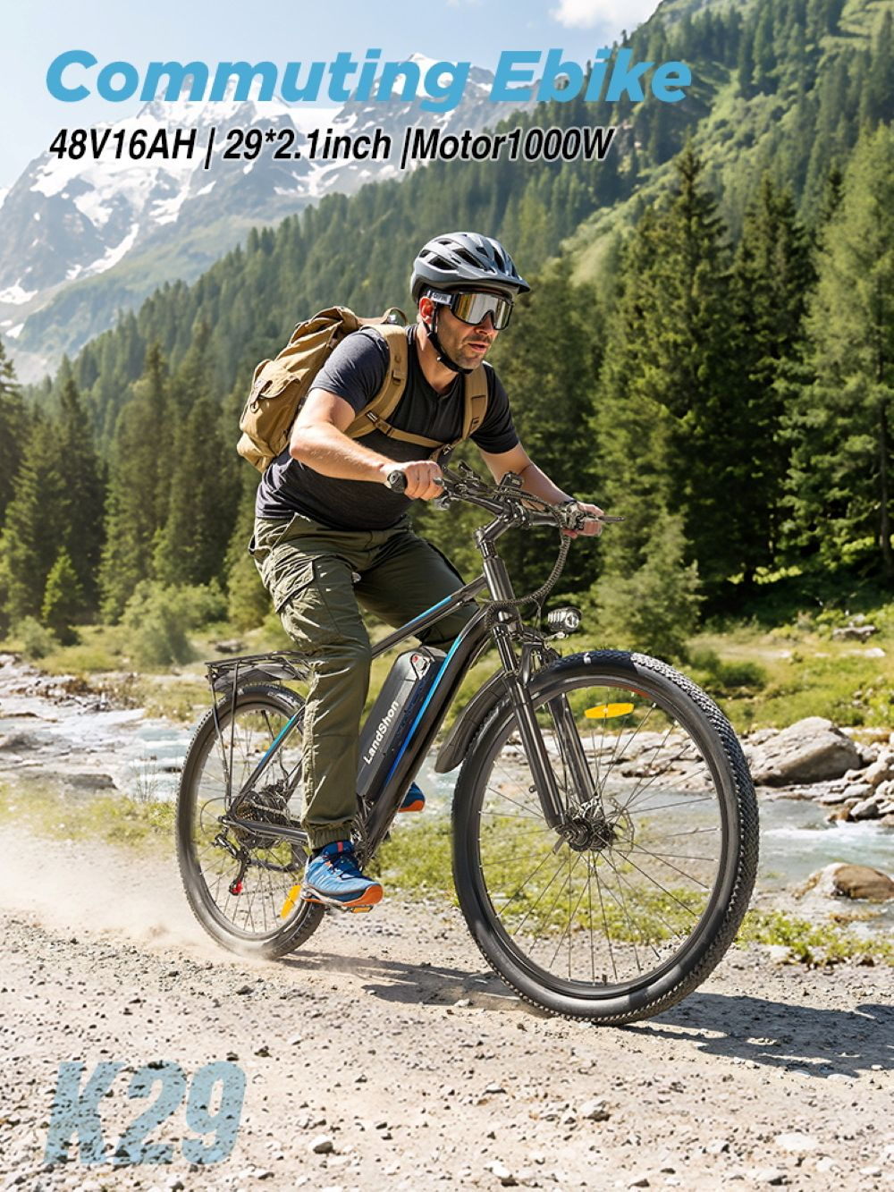 Un uomo guida una e-bike nera su un sentiero di ghiaia in montagna.