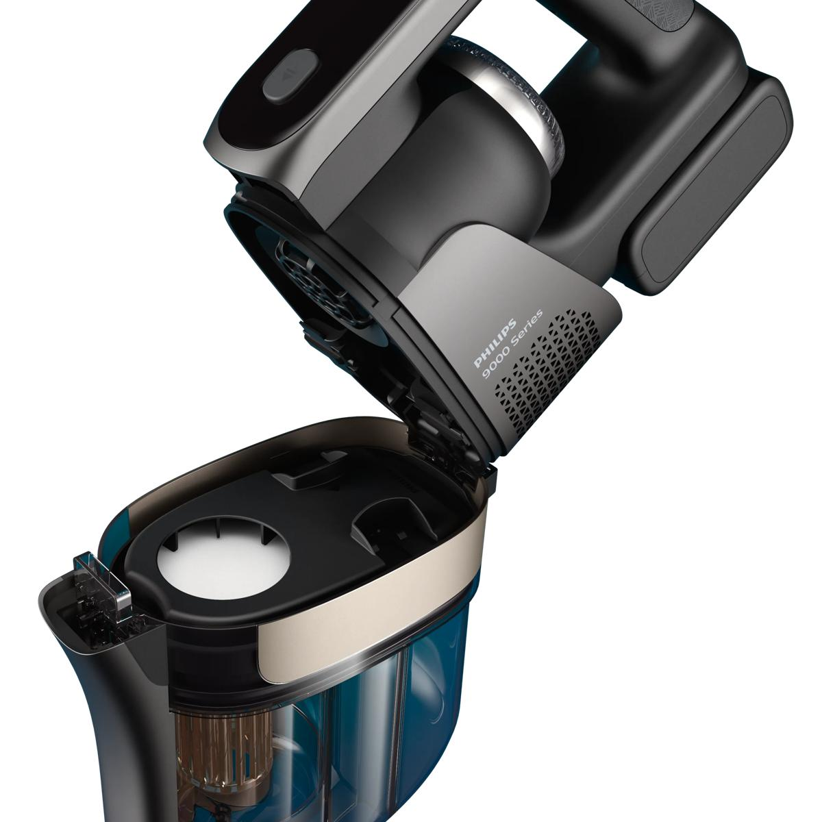 Ein schwarz-grauer Philips 9000 Series Akkustaubsauger, geöffnet, um den Staubbehälter und den Filter zu zeigen.