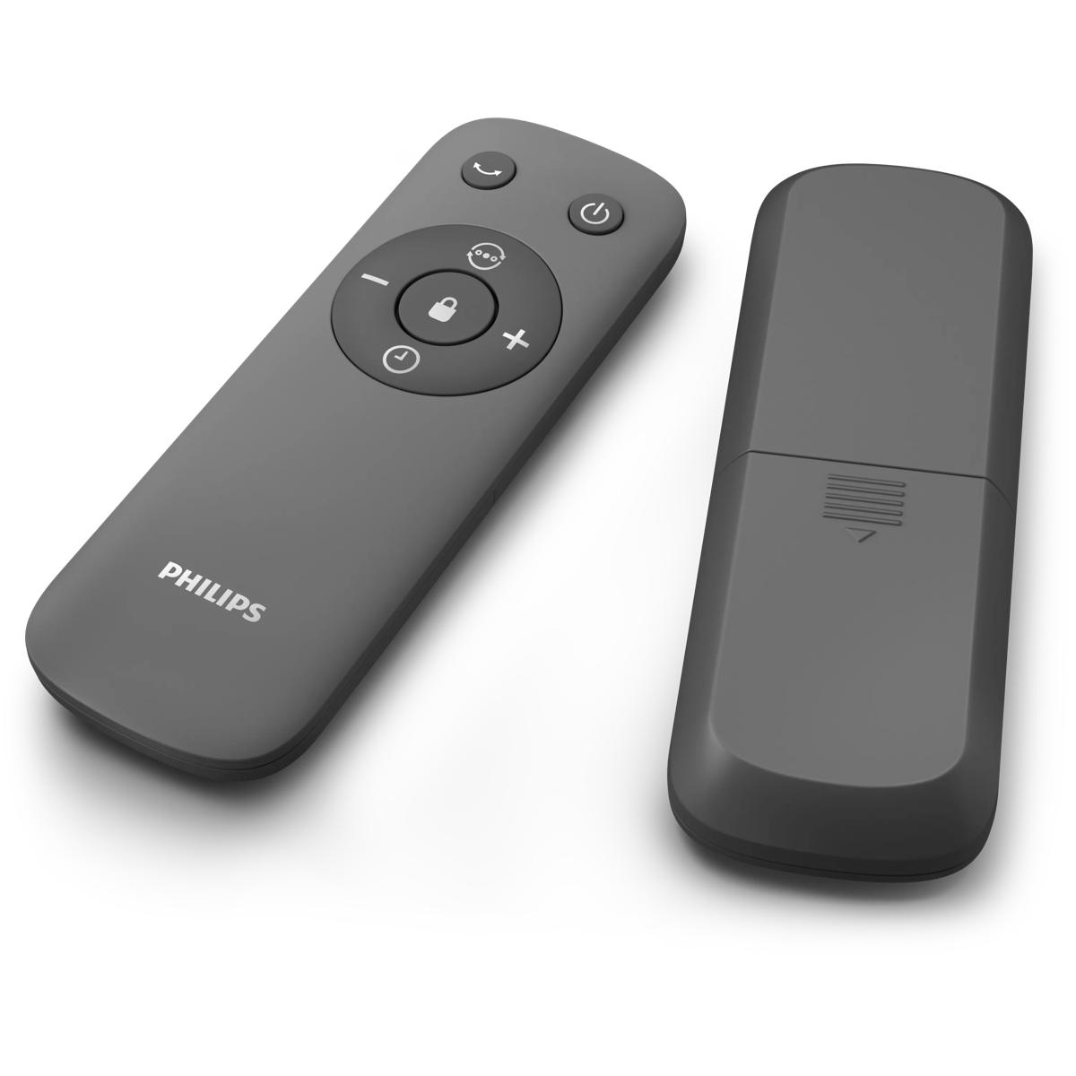 Düz beyaz bir arka plan üzerinde, biri önü diğeri arkası görünen gri renkli iki adet Philips uzaktan kumanda.