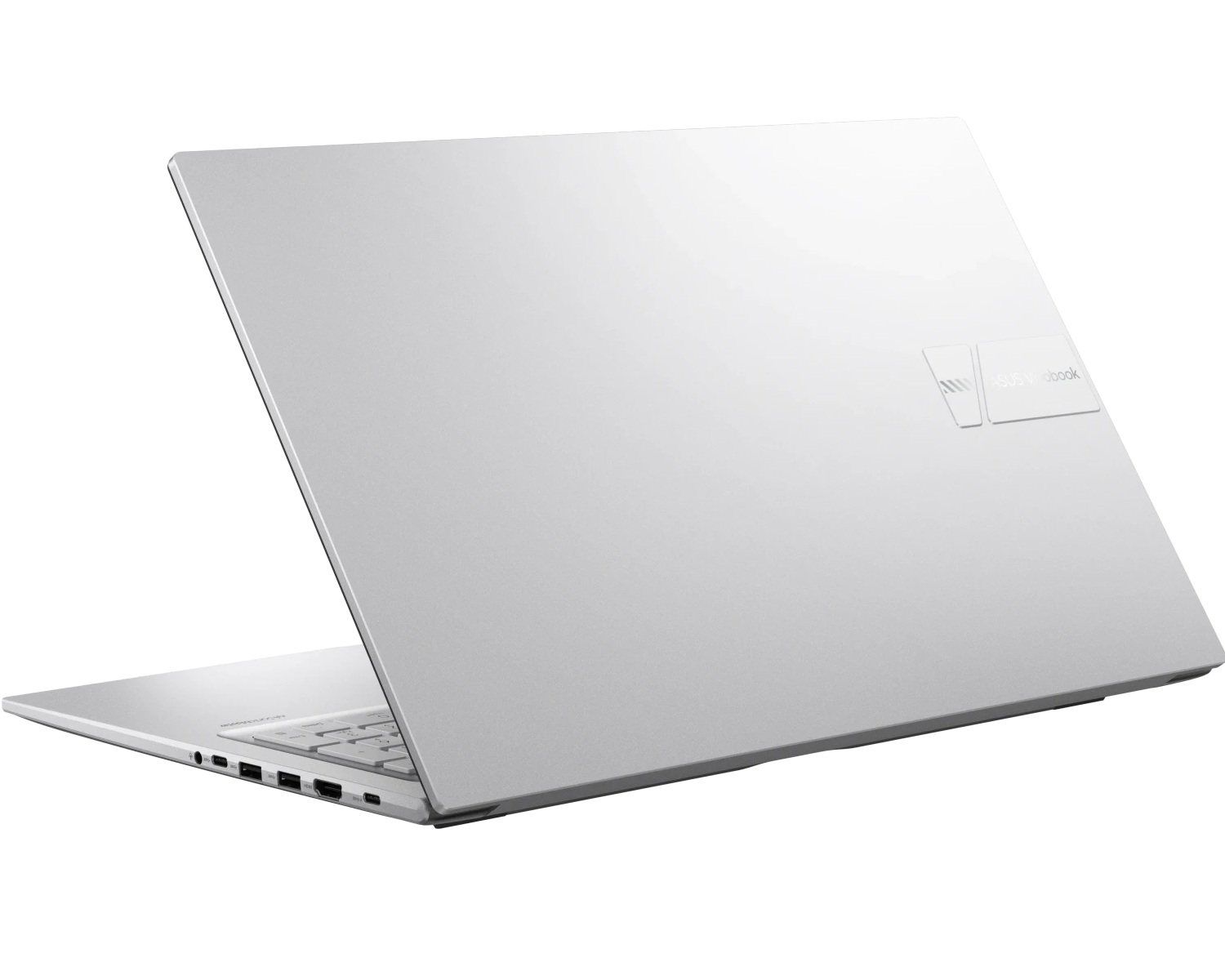 Ein silberner Laptop aus der Rückansicht mit elegantem Deckel und Anschlüssen an der Seite vor weißem Hintergrund.