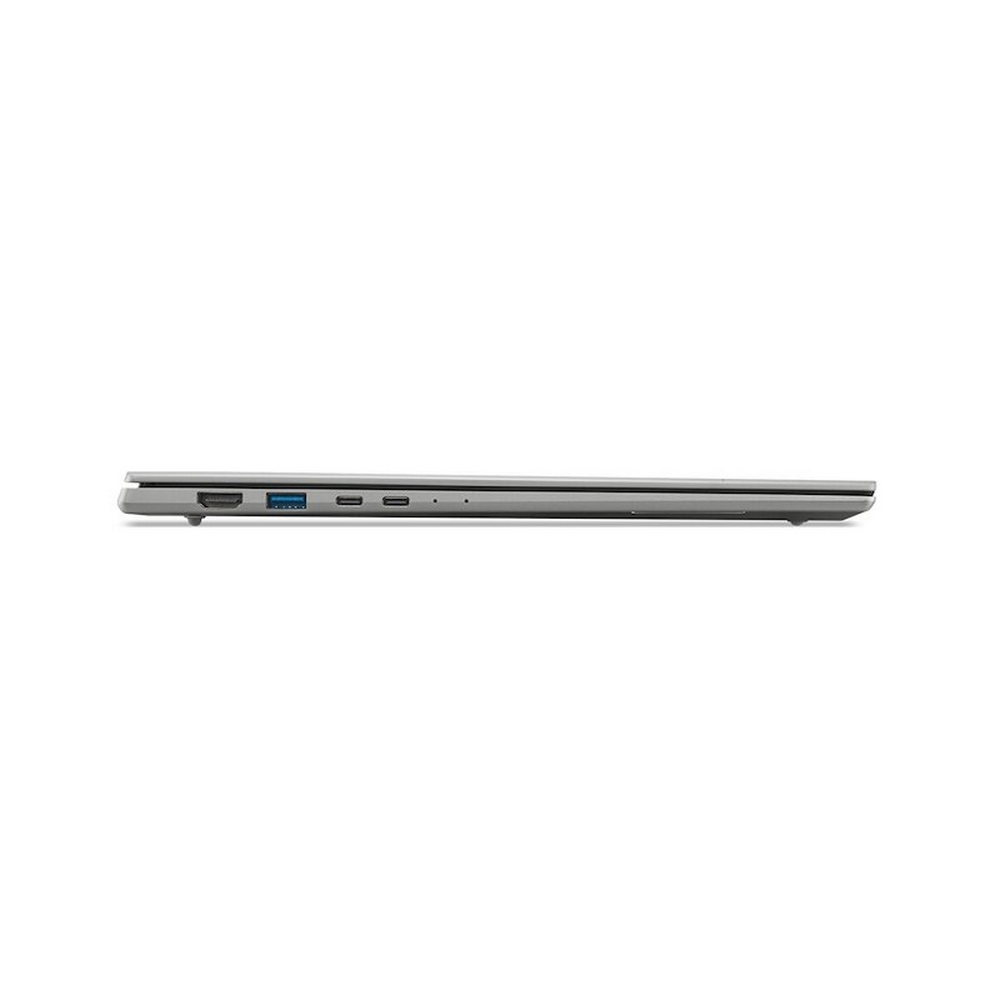 Profilo del lato sinistro di un laptop argentato chiuso che mostra porte come HDMI, USB e USB-C su sfondo bianco.