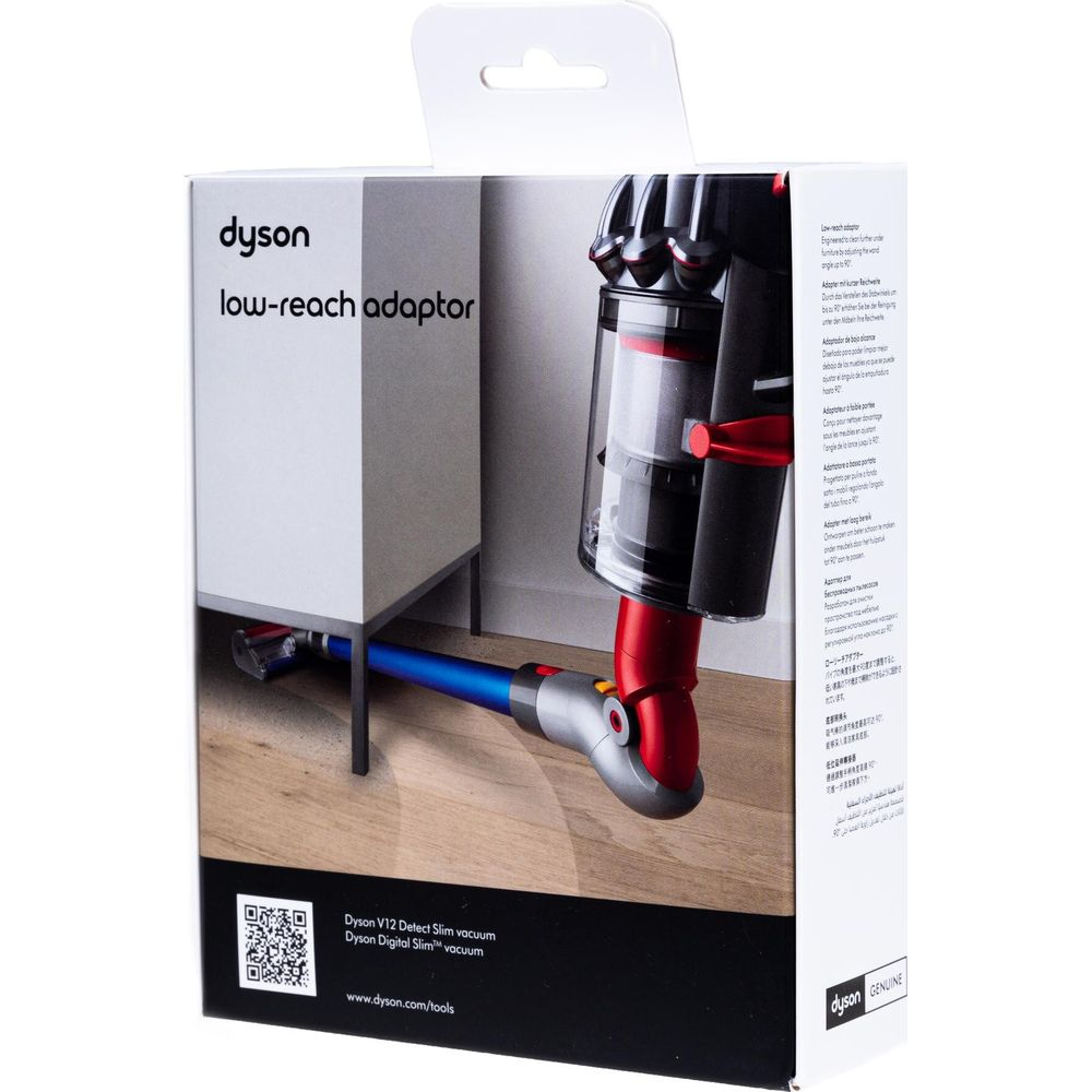 Boîte d'adaptateur bas Dyson montrant l'aspirateur sous un meuble.