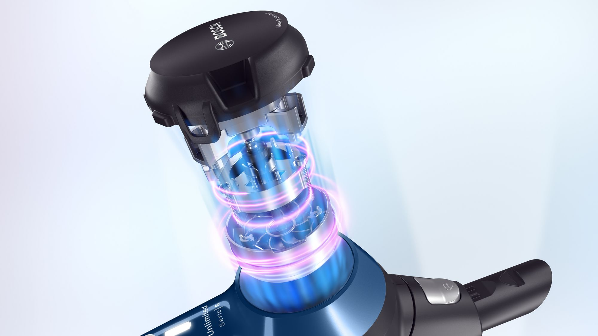 Vista despiezada de un motor de aspiradora Bosch con anillos de luz rosa y piezas internas.