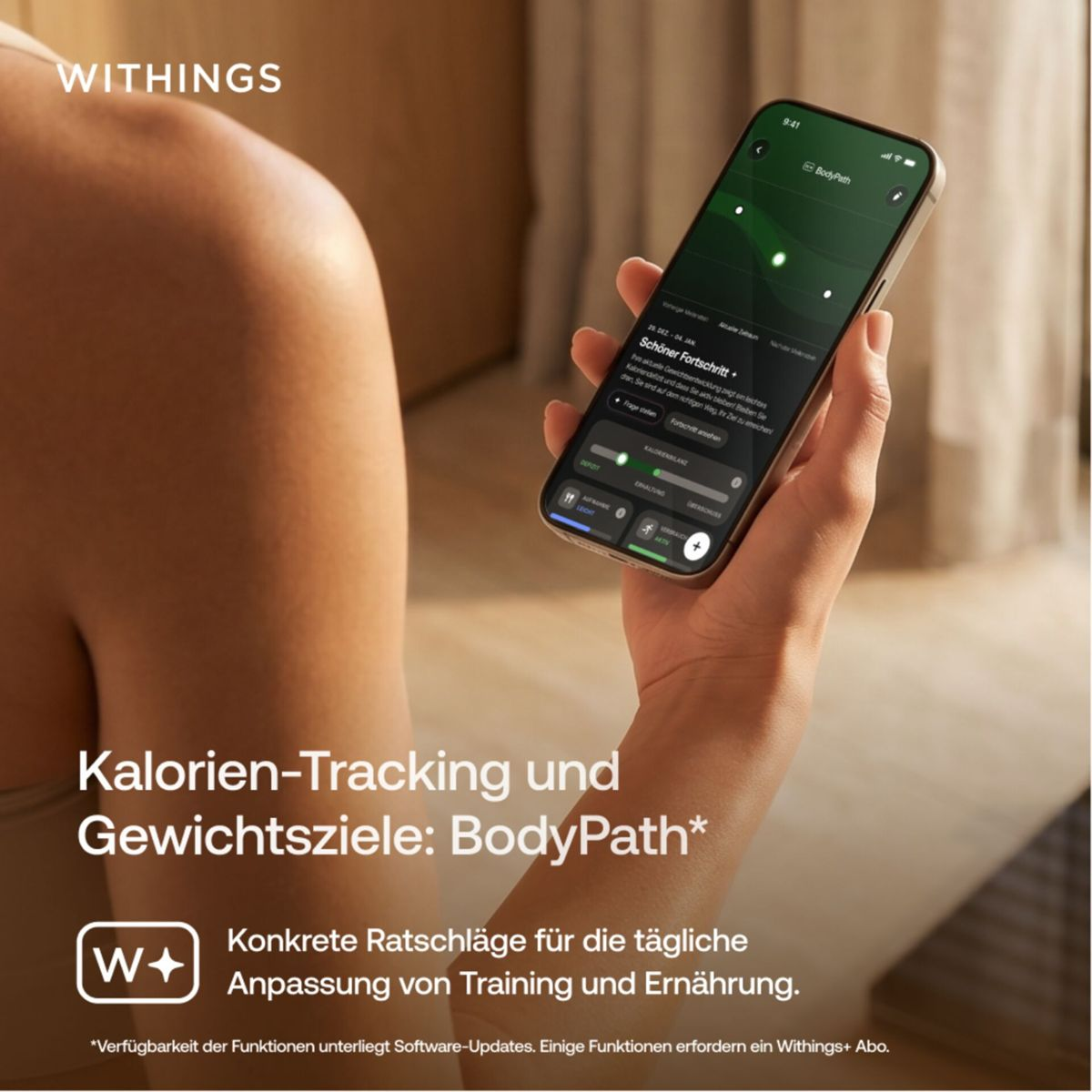 Eine Person hält ein Smartphone mit der Withings BodyPath App zur Gewichts- und Kalorienverfolgung.