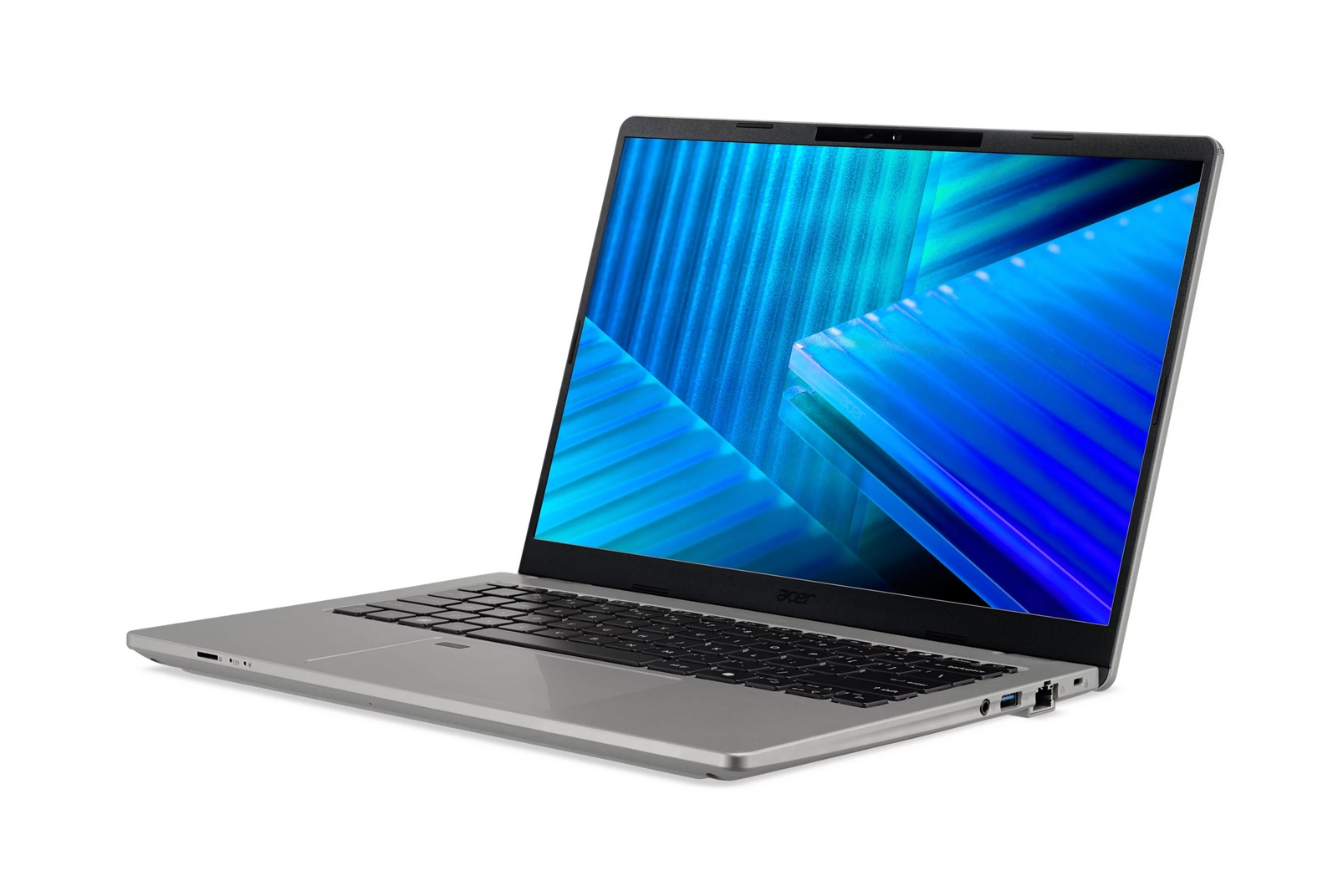 Un computer portatile argentato con tastiera nera e schermo con motivi blu su sfondo bianco.