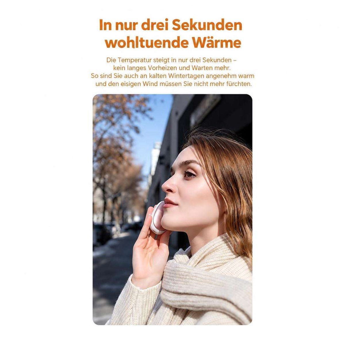 Eine Frau in einem weißen Pullover hält ein kleines weißes Gerät an ihr Gesicht, um sich im Winter zu wärmen.