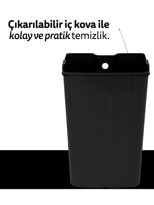 Kolay temizlik için çıkarılabilir iç kovaya sahip siyah plastik çöp kovası.